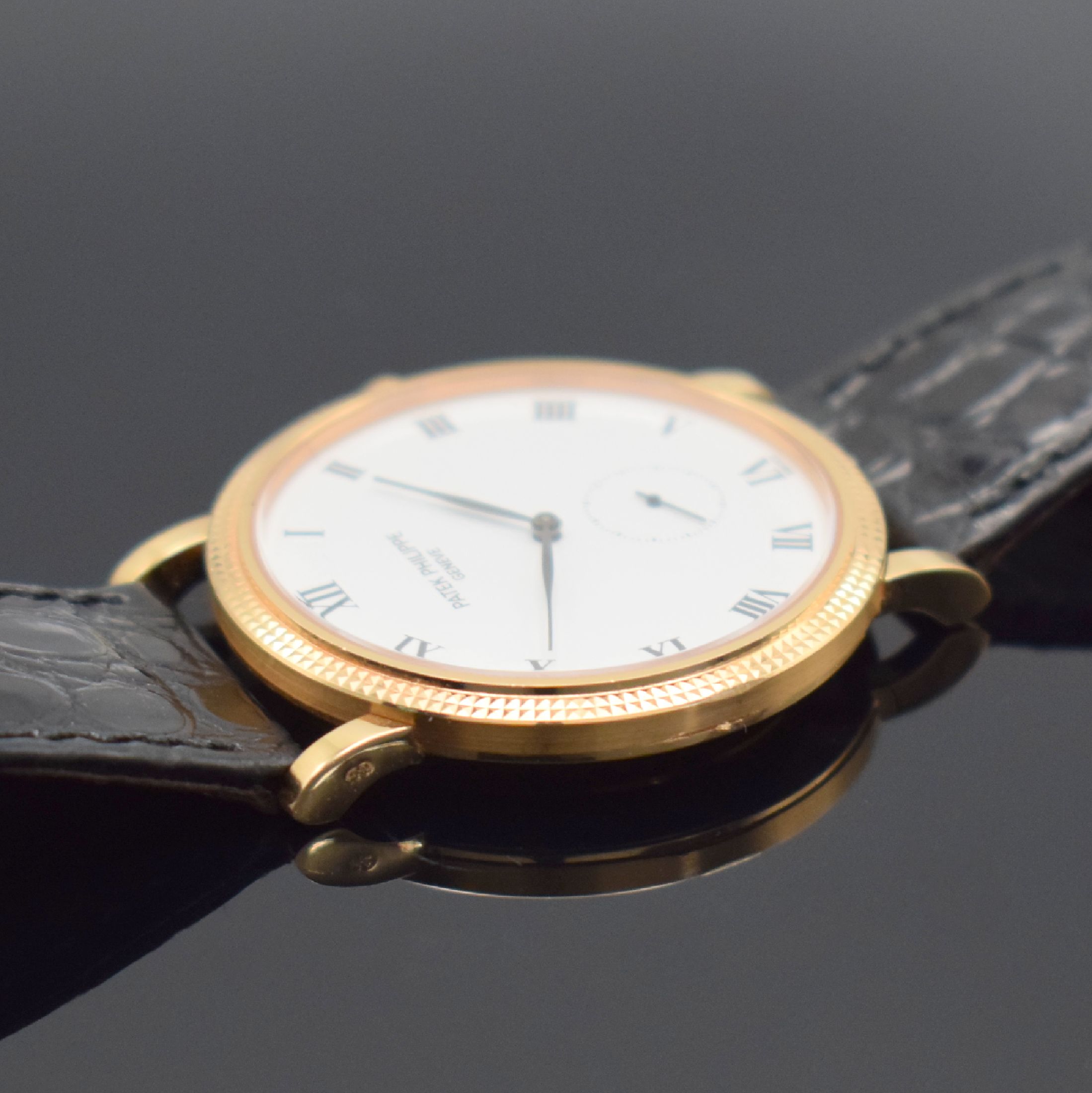 Detail e: PATEK PHILIPPE Herrenarmbanduhr Calatrava in Roségold 750/000 Referenz 3919R-001, Handaufzug, 2-tlg. Geh. inkl. orig. Lederband m. orig. Dornschl. ...