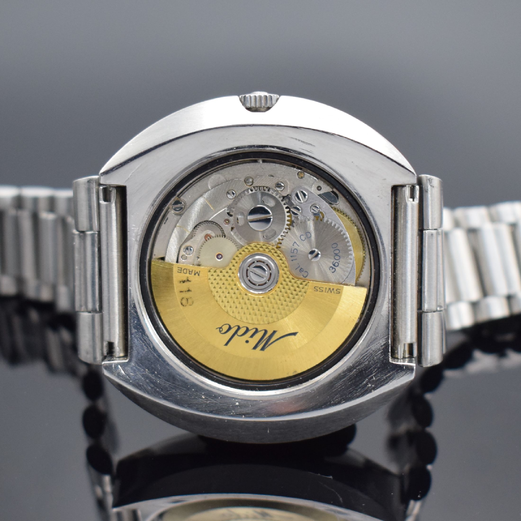 Detail d: MIDO Executive Chronometer H-B Herrenarmbanduhr, Schweiz um 1970, Automatik, massives Edelstahlgeh., Boden verschr., neutr. Stahlband m. Faltschl., ...