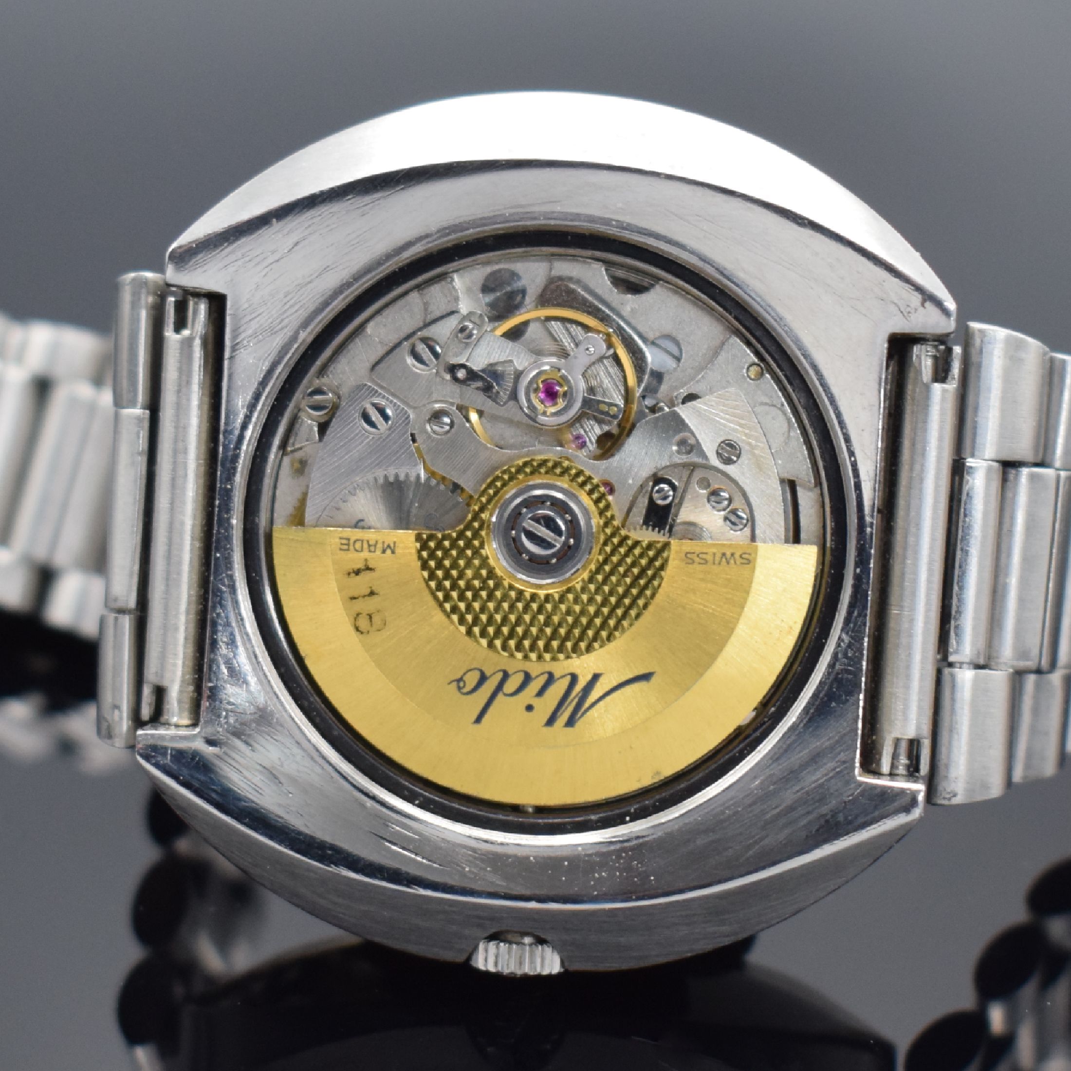 Detail e: MIDO Executive Chronometer H-B Herrenarmbanduhr, Schweiz um 1970, Automatik, massives Edelstahlgeh., Boden verschr., neutr. Stahlband m. Faltschl., ...
