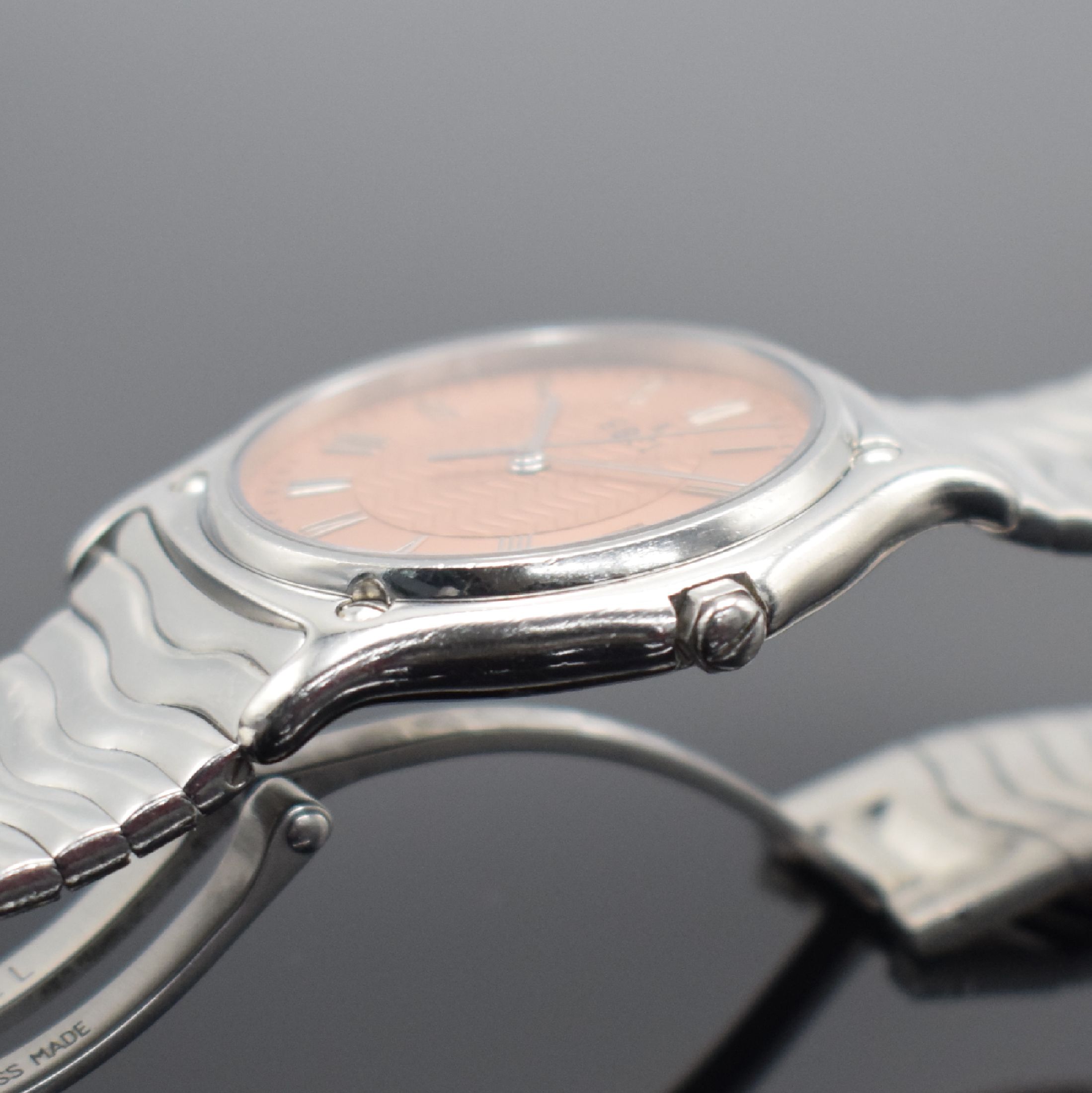 Detail c: EBEL Herrenarmbanduhr Sport Classique in Stahl, Schweiz um 1995, quarz, Ref. E9187142, Stülpgeh. m. 5-fach verschr. Lünette, orig. Gliederband m. ...