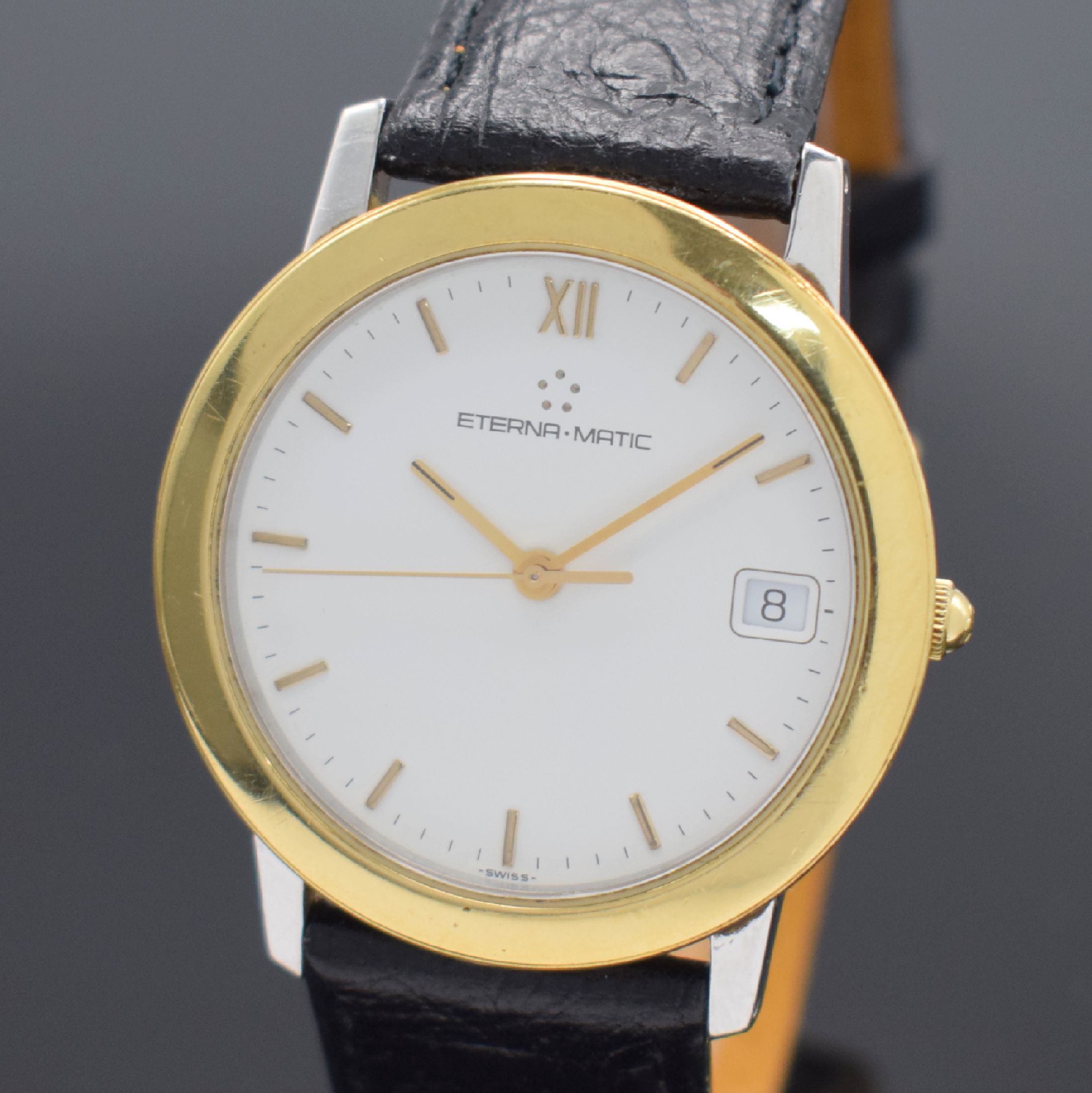 Detail a: ETERNA-MATIC 1856 Herrenarmbanduhr in Stahl/Gold, Schweiz um 1995, Automatik, beids. vergl. Geh., Boden aufgedr., weißes Zifferbl. m. gold. ...