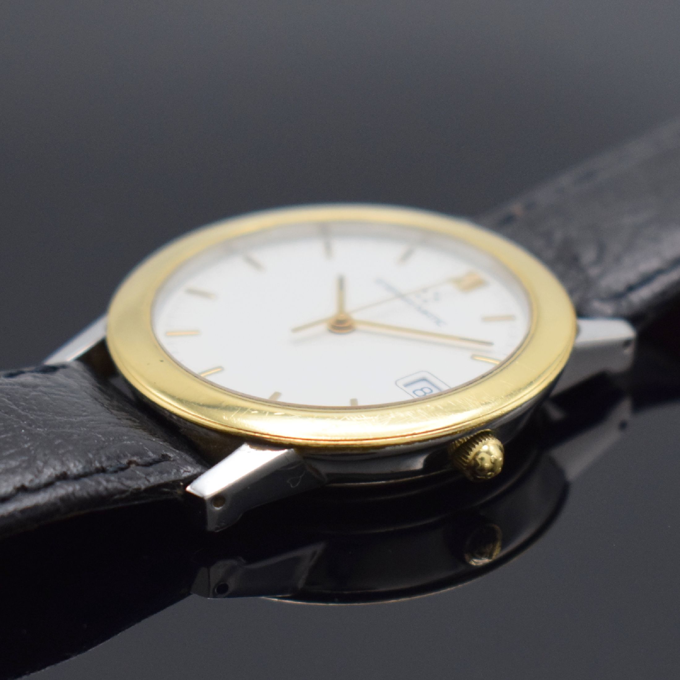 Detail b: ETERNA-MATIC 1856 Herrenarmbanduhr in Stahl/Gold, Schweiz um 1995, Automatik, beids. vergl. Geh., Boden aufgedr., weißes Zifferbl. m. gold. ...