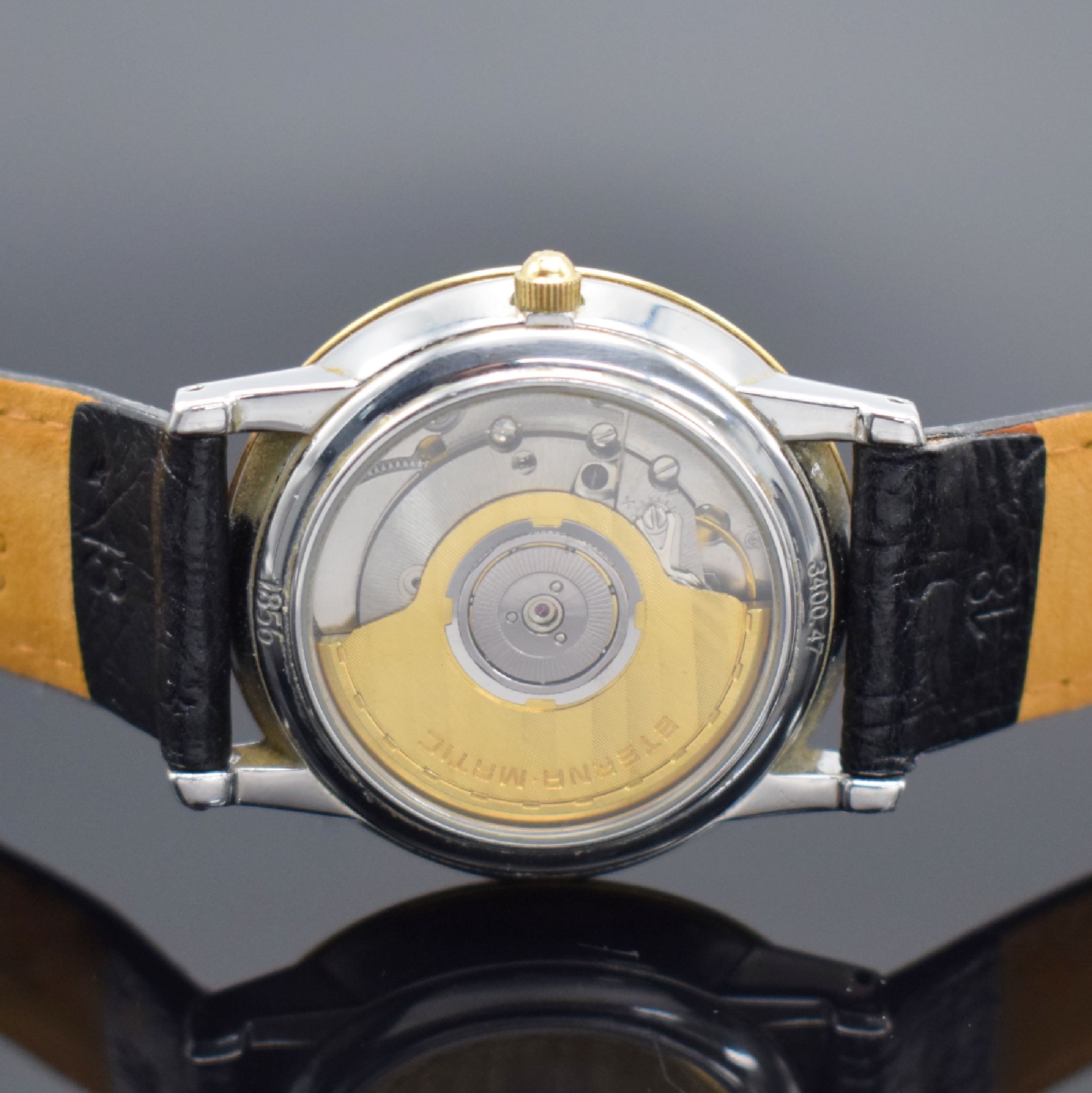 Detail c: ETERNA-MATIC 1856 Herrenarmbanduhr in Stahl/Gold, Schweiz um 1995, Automatik, beids. vergl. Geh., Boden aufgedr., weißes Zifferbl. m. gold. ...