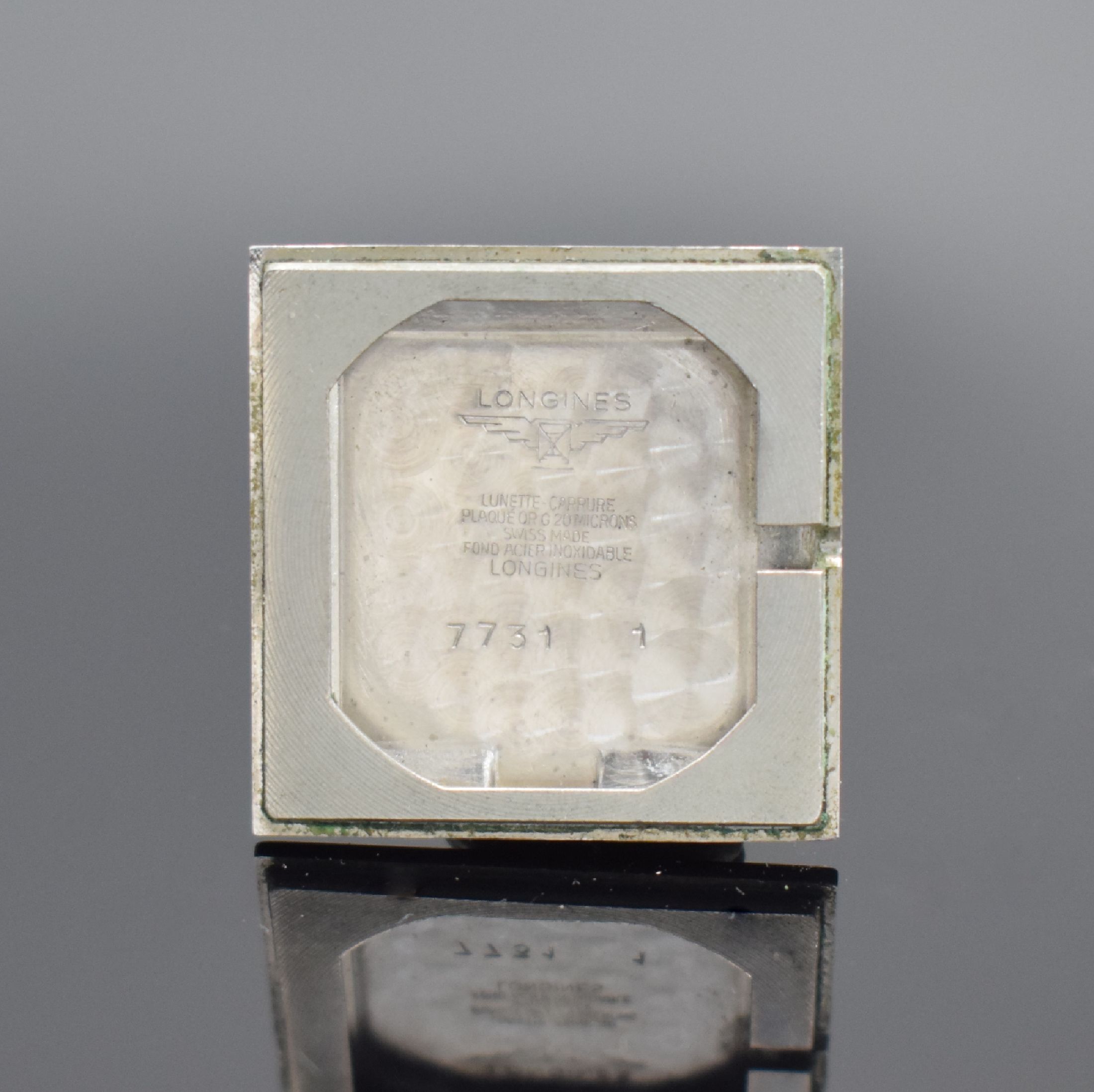 Detail e: LONGINES vergoldete Armbanduhr Referenz 7731/1, Schweiz um 1968, Handaufzug, Stahlboden aufgedr., silb. Zifferbl. altersb. fl., 4 gold. Std.-Ind. & ...