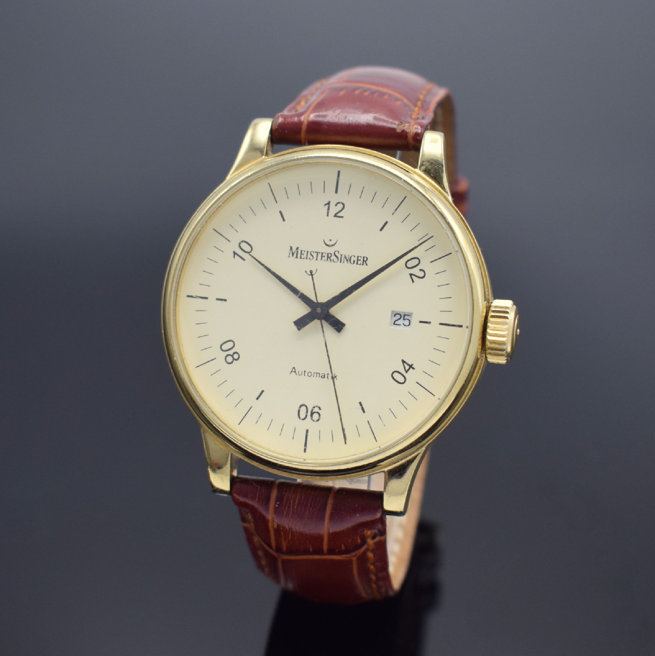MEISTERSINGER Scripto vergoldete Herrenarmbanduhr, Deutschland um 2001, Automatik, beids. vergl. Geh., Boden verschr., elfenbeinfarb. Zifferbl. m. ...