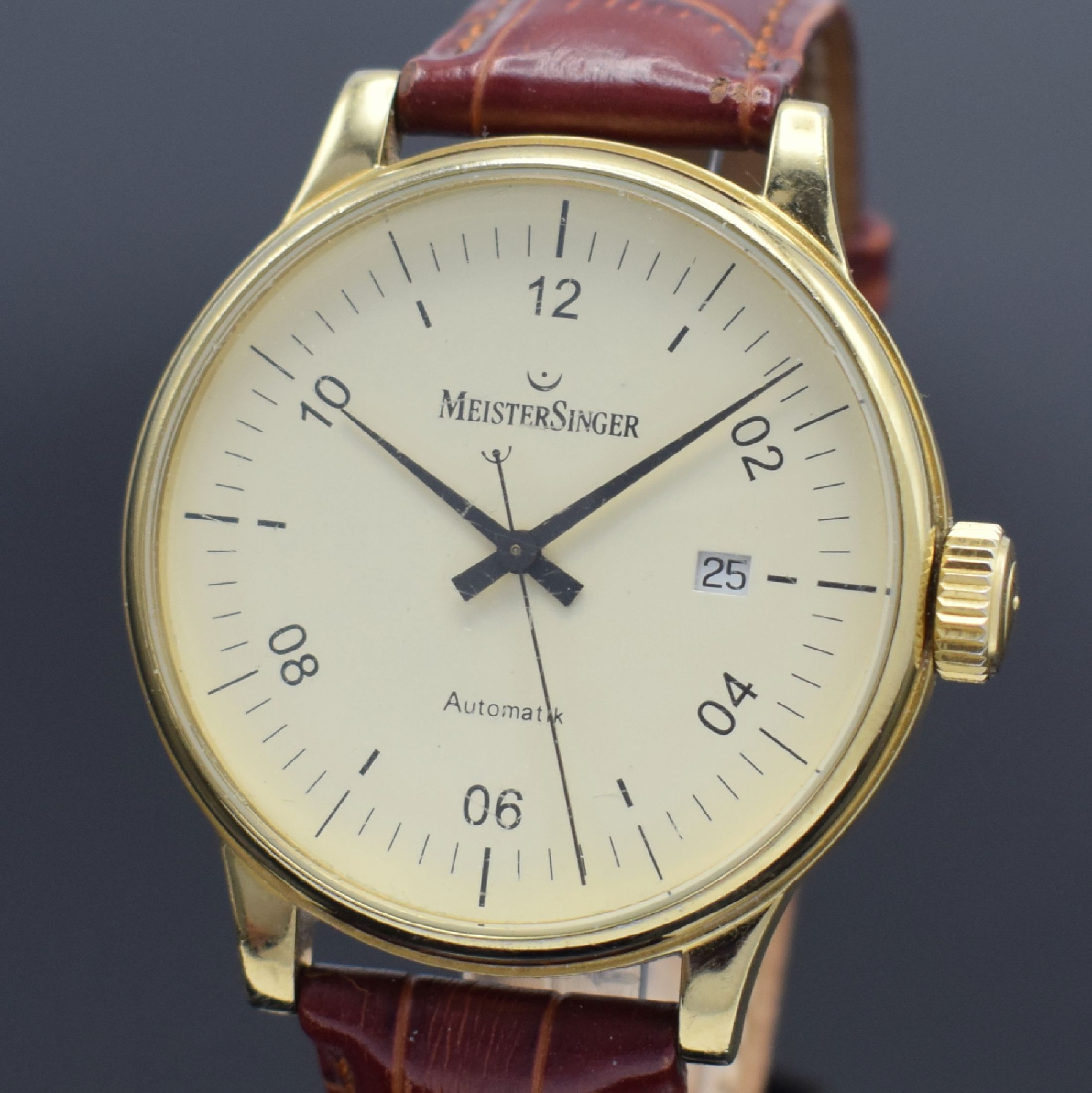 Detail a: MEISTERSINGER Scripto vergoldete Herrenarmbanduhr, Deutschland um 2001, Automatik, beids. vergl. Geh., Boden verschr., elfenbeinfarb. Zifferbl. m. ...
