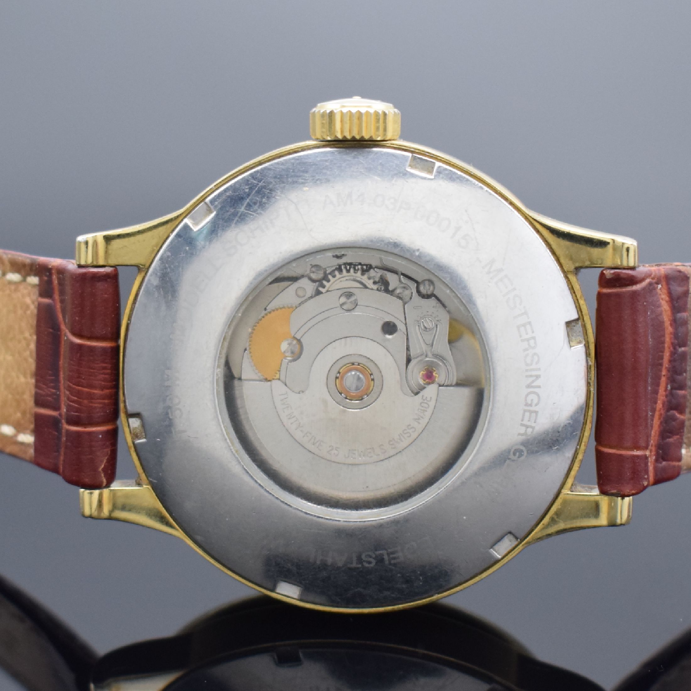 Detail c: MEISTERSINGER Scripto vergoldete Herrenarmbanduhr, Deutschland um 2001, Automatik, beids. vergl. Geh., Boden verschr., elfenbeinfarb. Zifferbl. m. ...