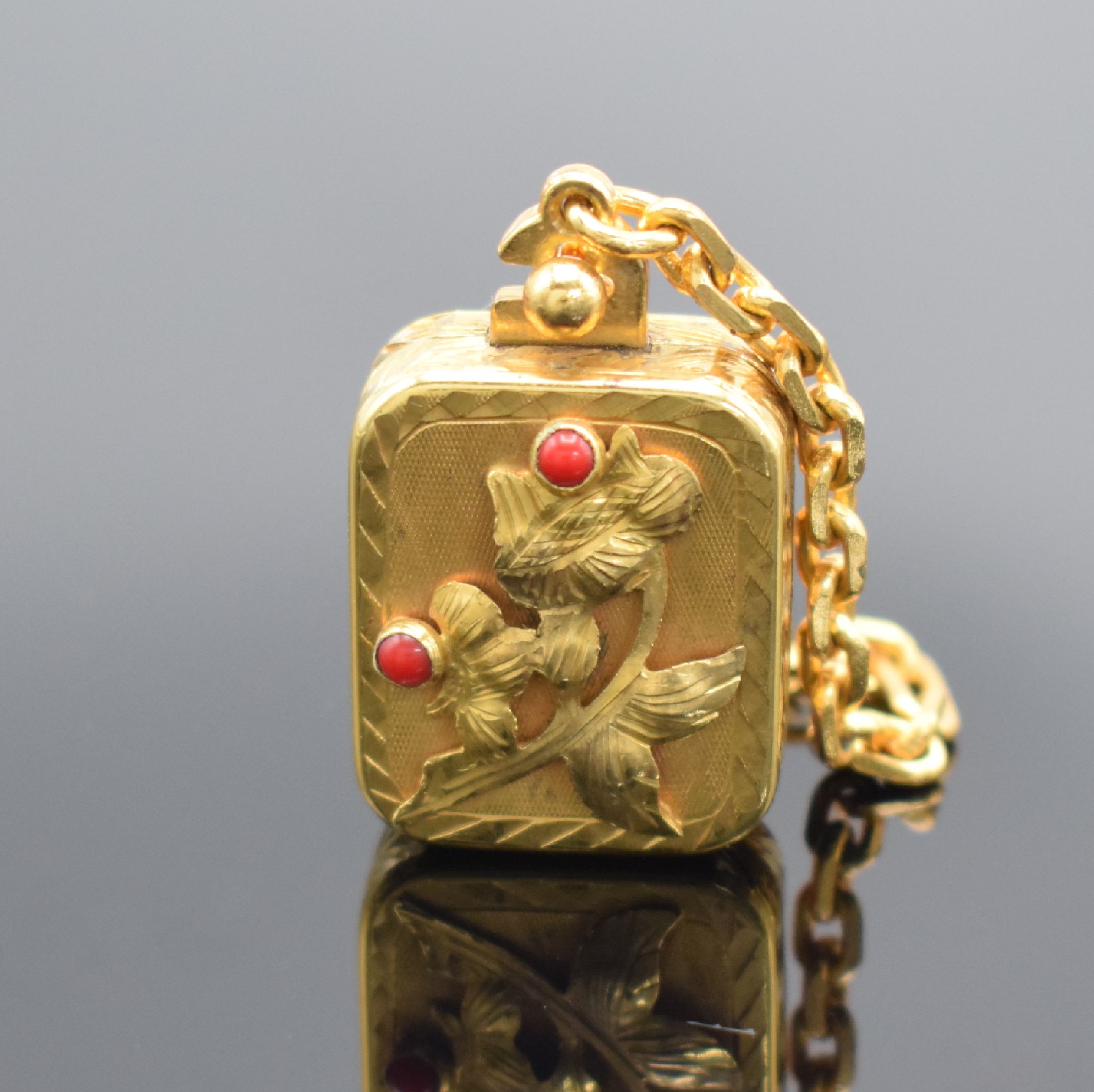 REUGE vergoldete Miniaturspieluhr mit Kette, Schweiz um 1950, Melodie "Ich hab getanzt heut Nacht", gedr., floral verz. & m. Schmucksteinen ...