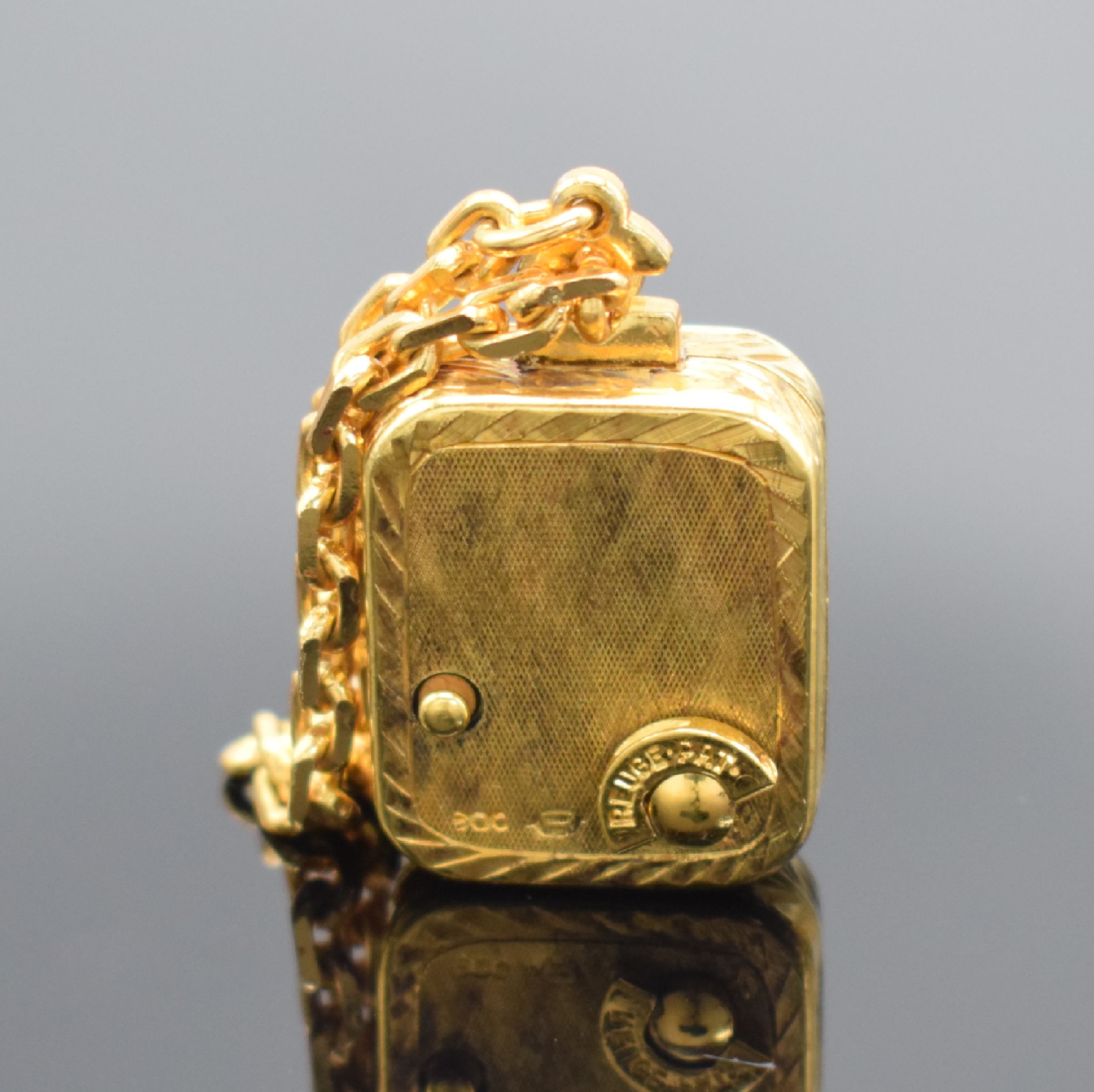 Detail b: REUGE vergoldete Miniaturspieluhr mit Kette, Schweiz um 1950, Melodie "Ich hab getanzt heut Nacht", gedr., floral verz. & m. Schmucksteinen ...