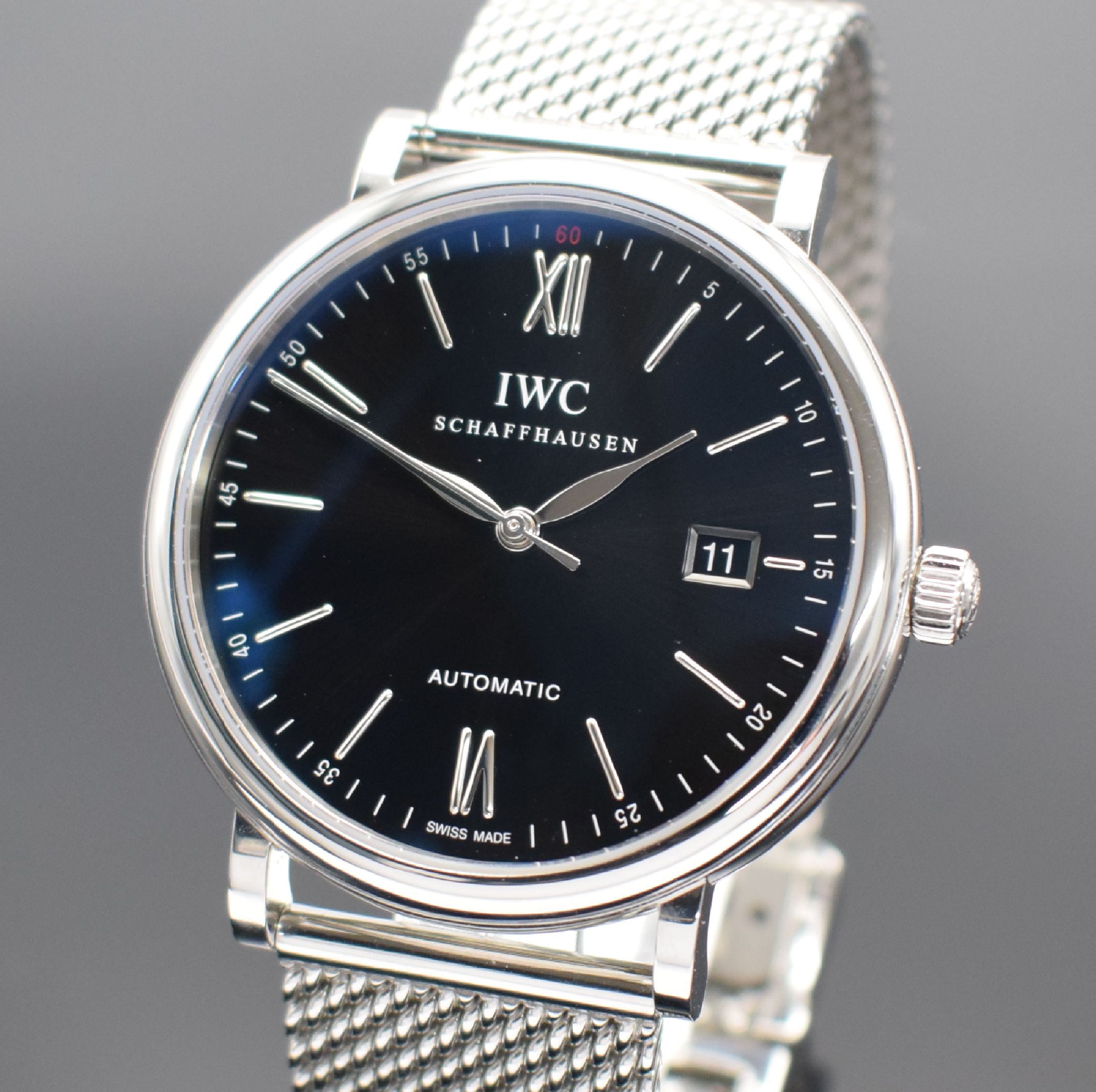 Detail a: IWC Herrenarmbanduhr Portofino Referenz 3565, Automatik, Schweiz um 2020, Edelstahlgeh. inkl. orig. Mesh-Band m. Faltschl., Boden 6-fach verschr., ...