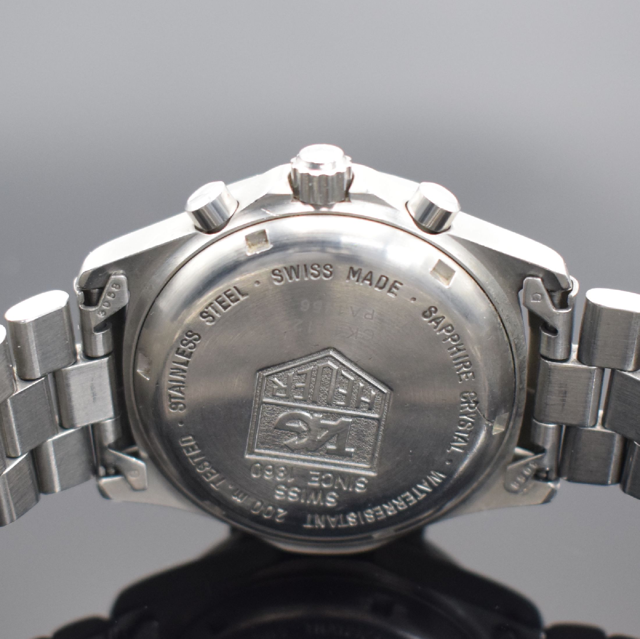 Detail d: TAG HEUER Professional Armbandchronograph in Stahl Referenz CK1112, Schweiz um 1998, Boden & Krone verschr., Gliederband m. Faltschl. & ...