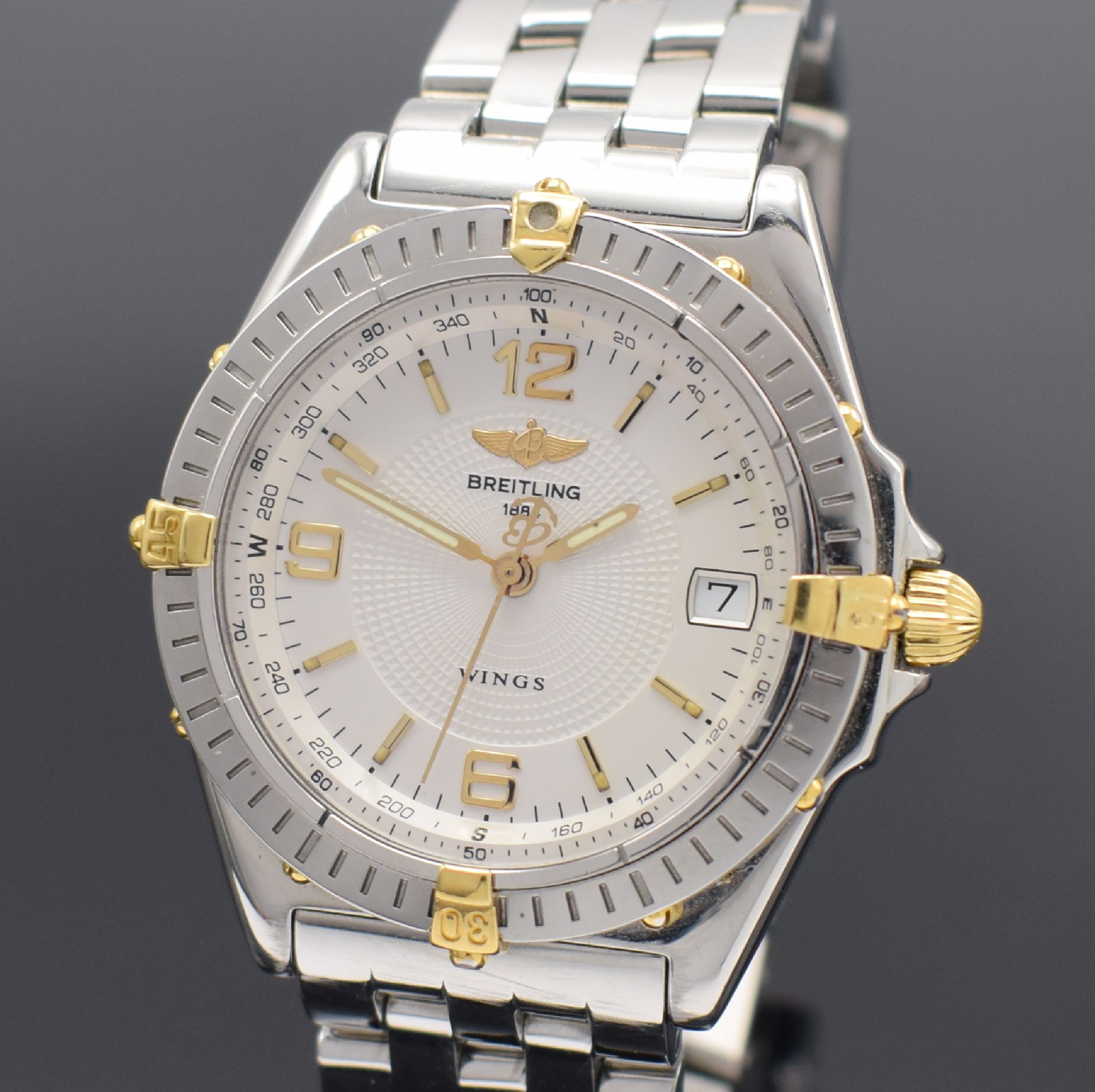 Detail a: BREITLING Mediumarmbanduhr Modellserie Wings Referenz B10050,Schweiz um 1999, Automatik, Edelstahlgeh. inkl. Gliederband m. Faltschl., Krone & Reiter ...