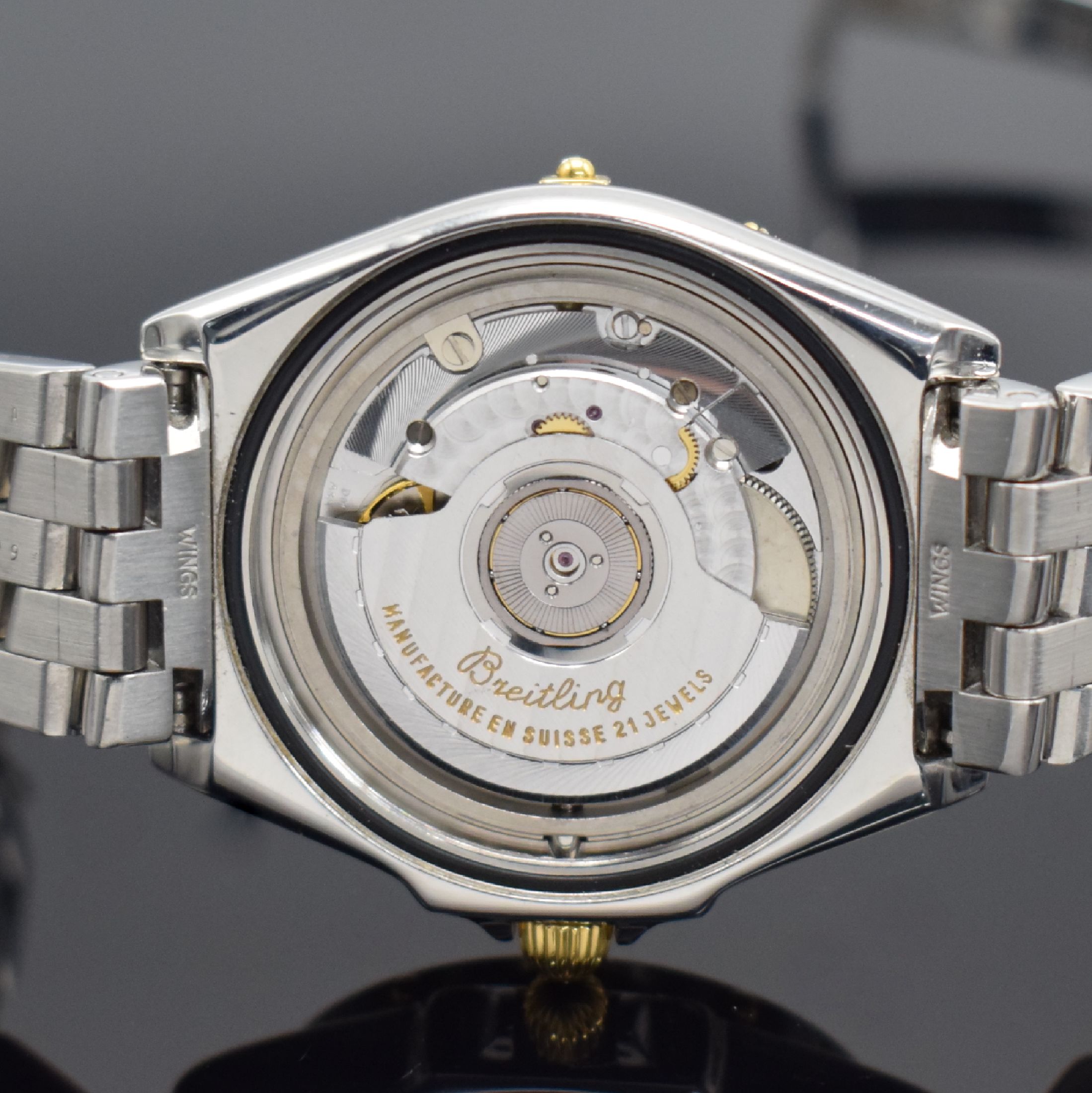 Detail f: BREITLING Mediumarmbanduhr Modellserie Wings Referenz B10050,Schweiz um 1999, Automatik, Edelstahlgeh. inkl. Gliederband m. Faltschl., Krone & Reiter ...