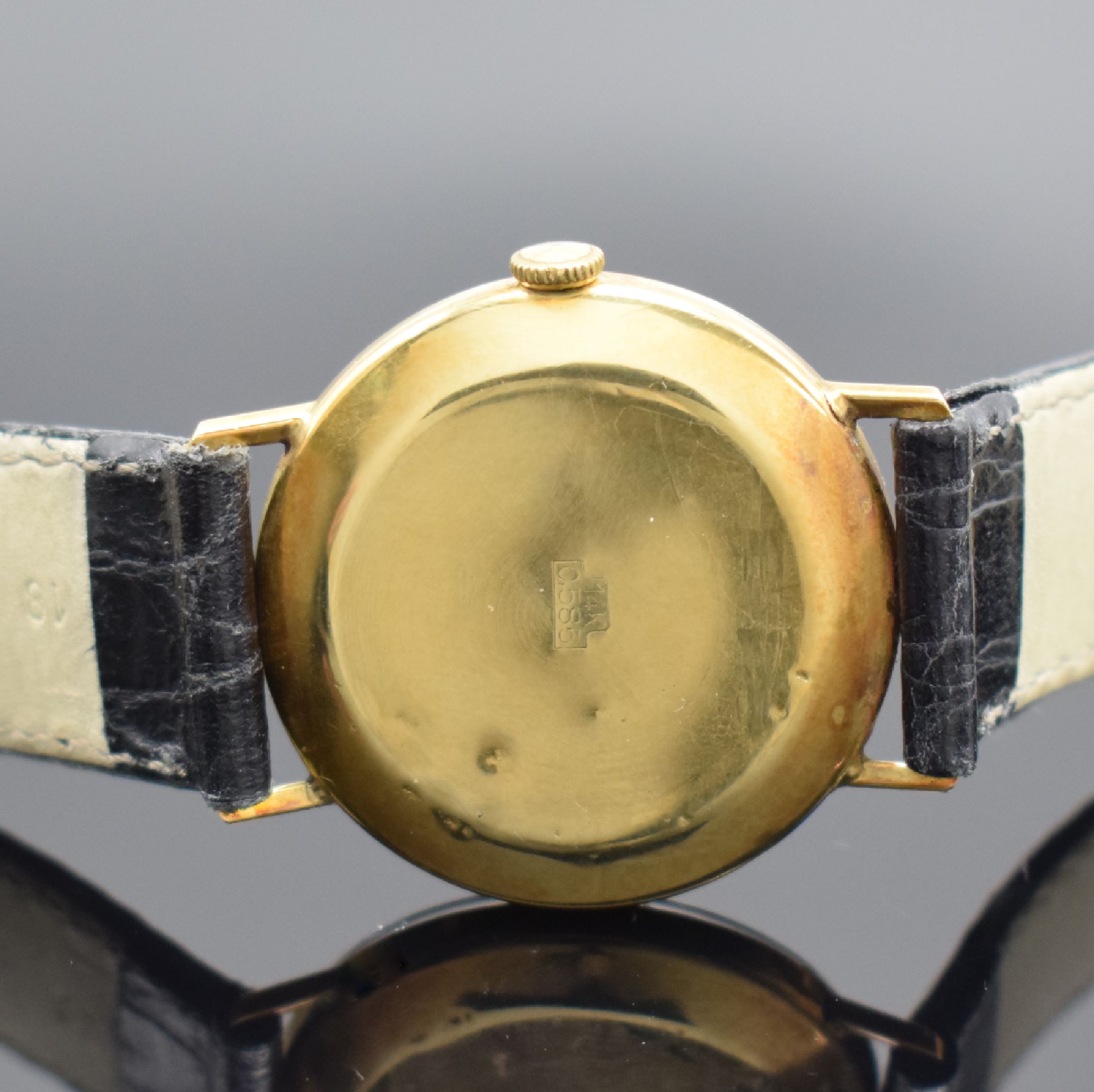 Detail c: ANKER Herrenarmbanduhr in GG 750/000, Schweiz um 1965, Handaufzug, dell. Stülpgeh. teils angel., silb. Zifferbl. altersb. fl., gold. Std.-Ind. & ...