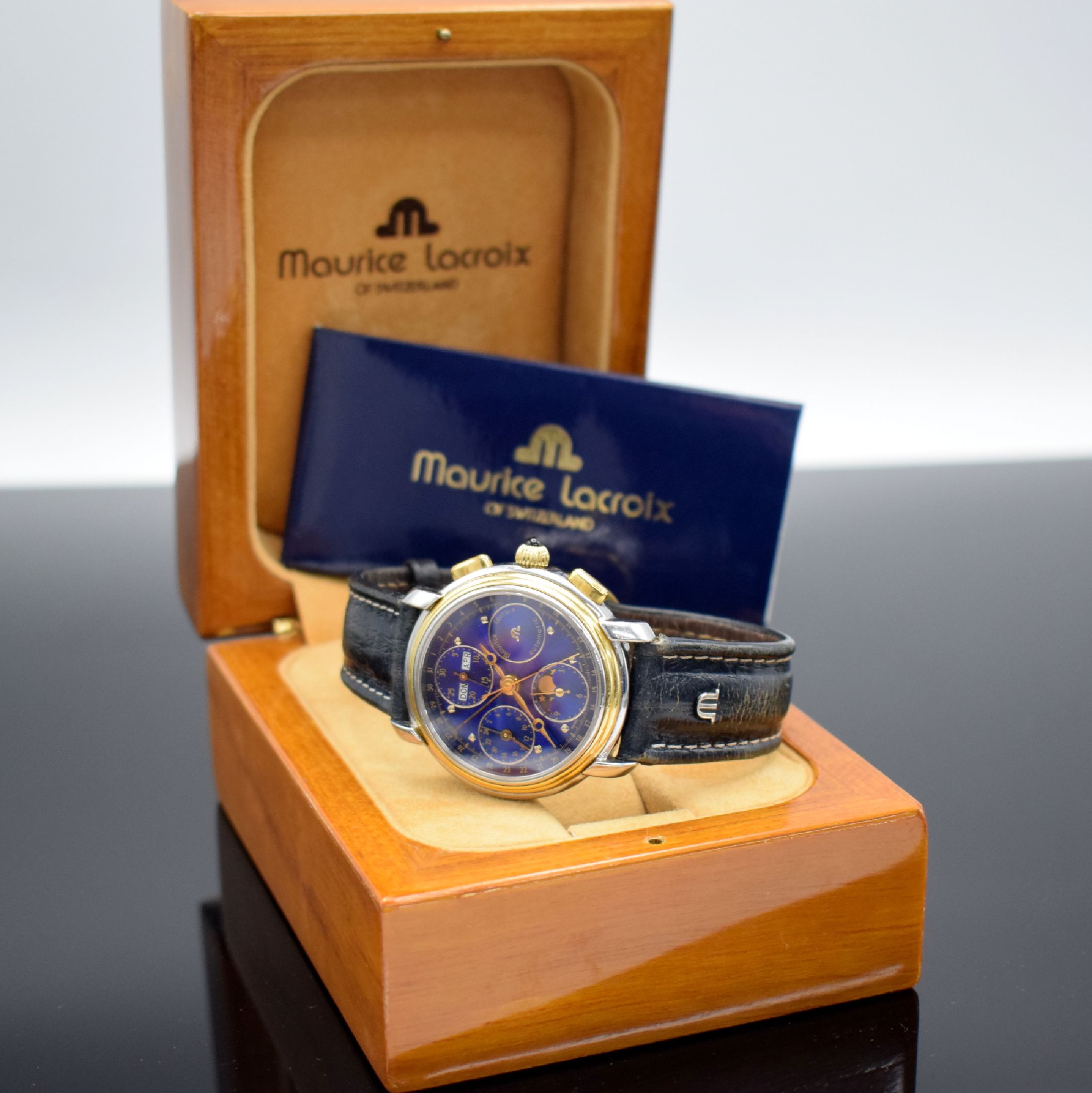 Detail e: MAURICE LACROIX Herrenarmbanduhr mit Chronograph & Vollkalender Referenz 66412, Schweiz um 1994, Automatik, beids. vergl. Gehäuse in Edelstahl & ...