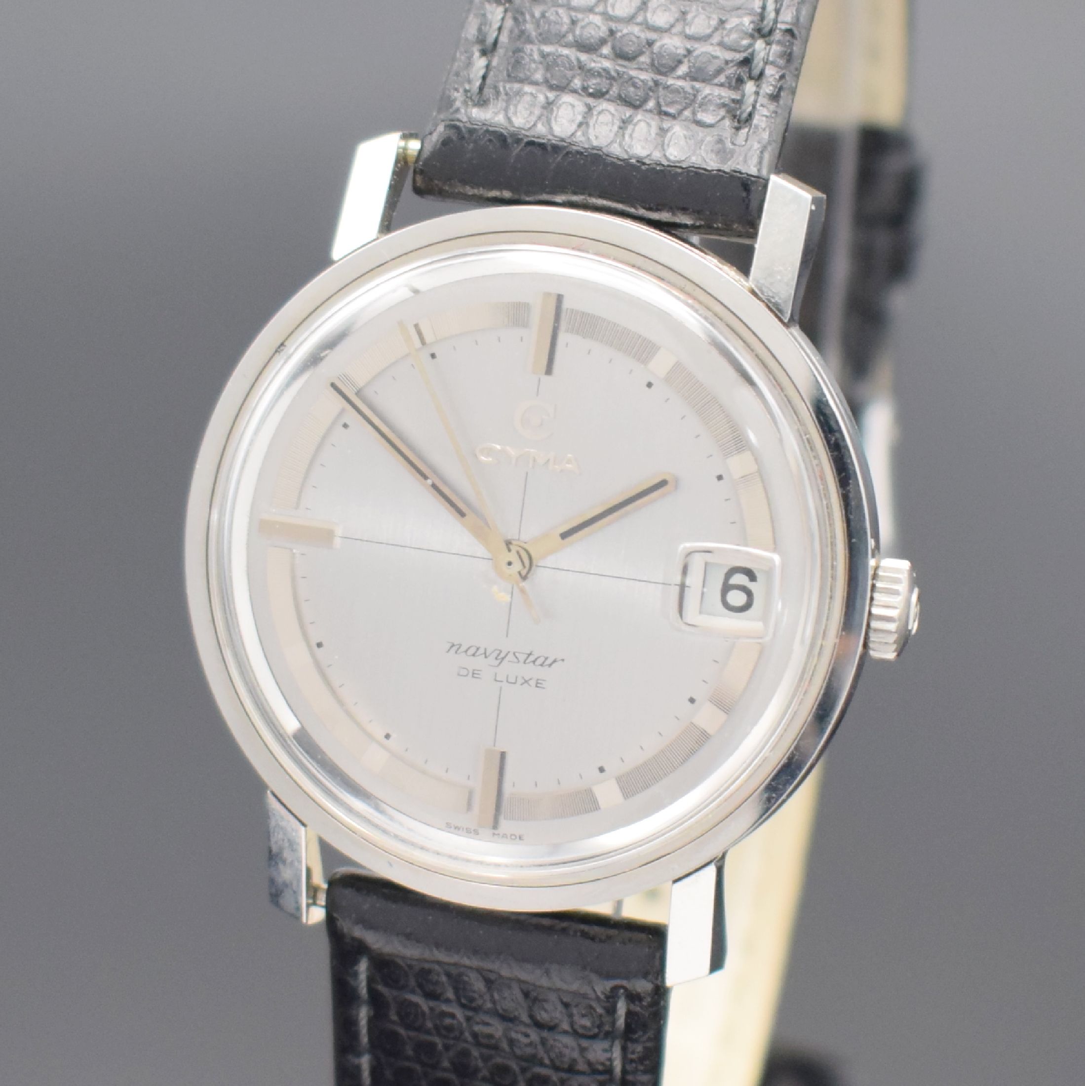 Detail a: CYMA Navystar De Luxe nahezu neuwertige Herrenarmbanduhr in Stahl, Schweiz um 1965, Handaufzug, Boden verschr., sehr schönes, außergew. silb. orig. ...