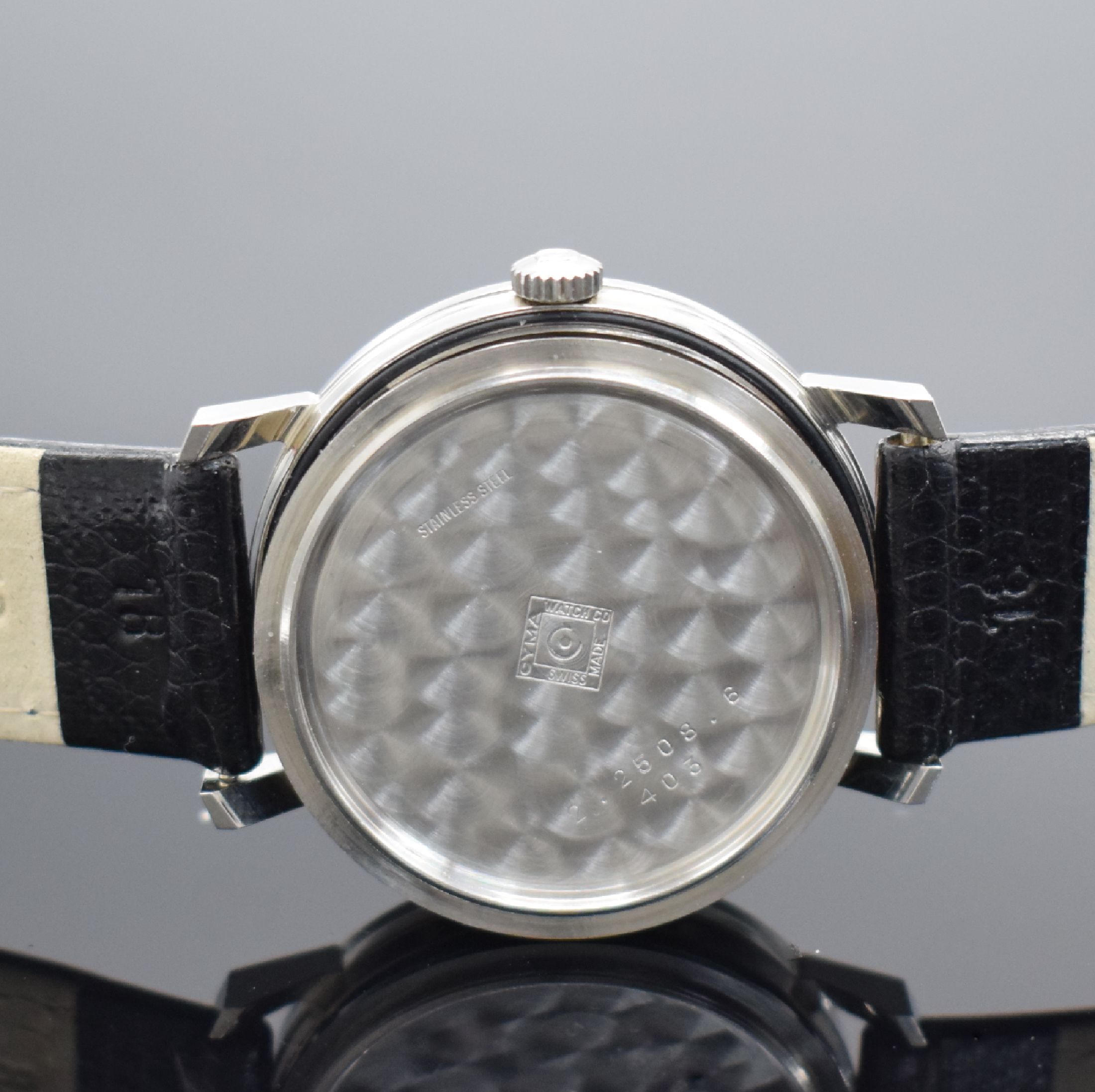 Detail e: CYMA Navystar De Luxe nahezu neuwertige Herrenarmbanduhr in Stahl, Schweiz um 1965, Handaufzug, Boden verschr., sehr schönes, außergew. silb. orig. ...