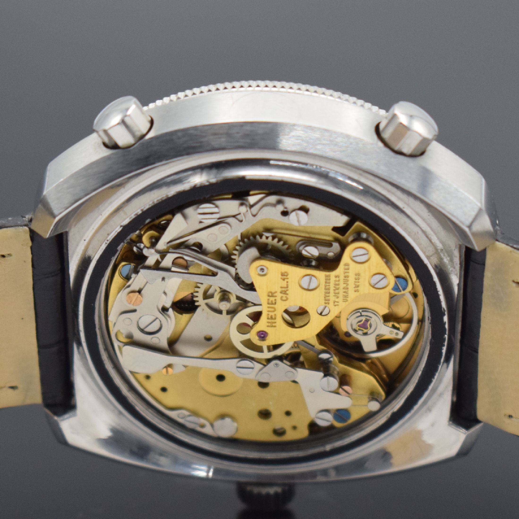 Detail h: HEUER Calculator Herrenchronograph in Stahl Referenz 150.633, Schweiz um 1975, Automatik, verschr. Geh. Aluminium Rechenschieber-Lünette, orig. ...