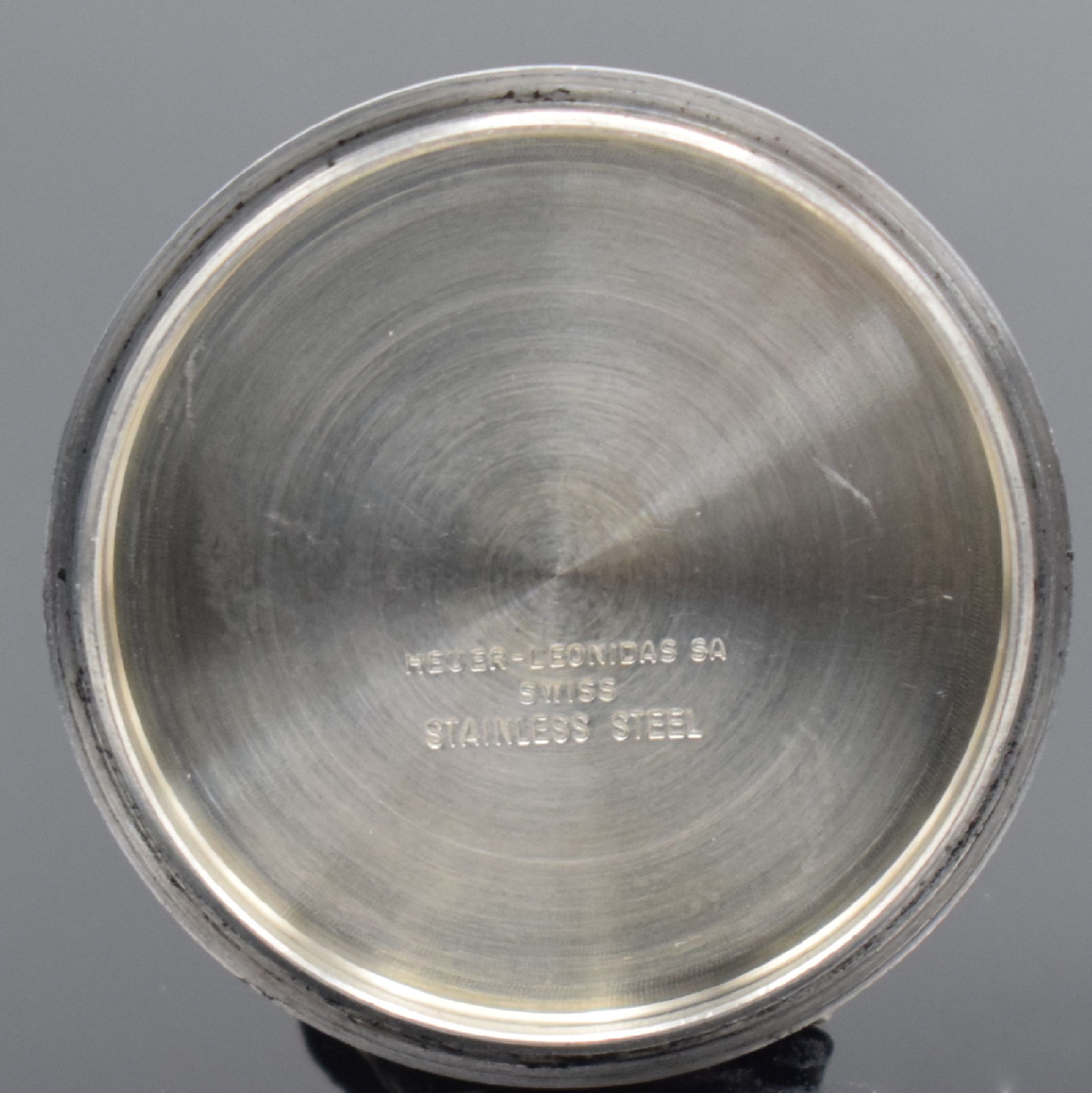 Detail i: HEUER Calculator Herrenchronograph in Stahl Referenz 150.633, Schweiz um 1975, Automatik, verschr. Geh. Aluminium Rechenschieber-Lünette, orig. ...