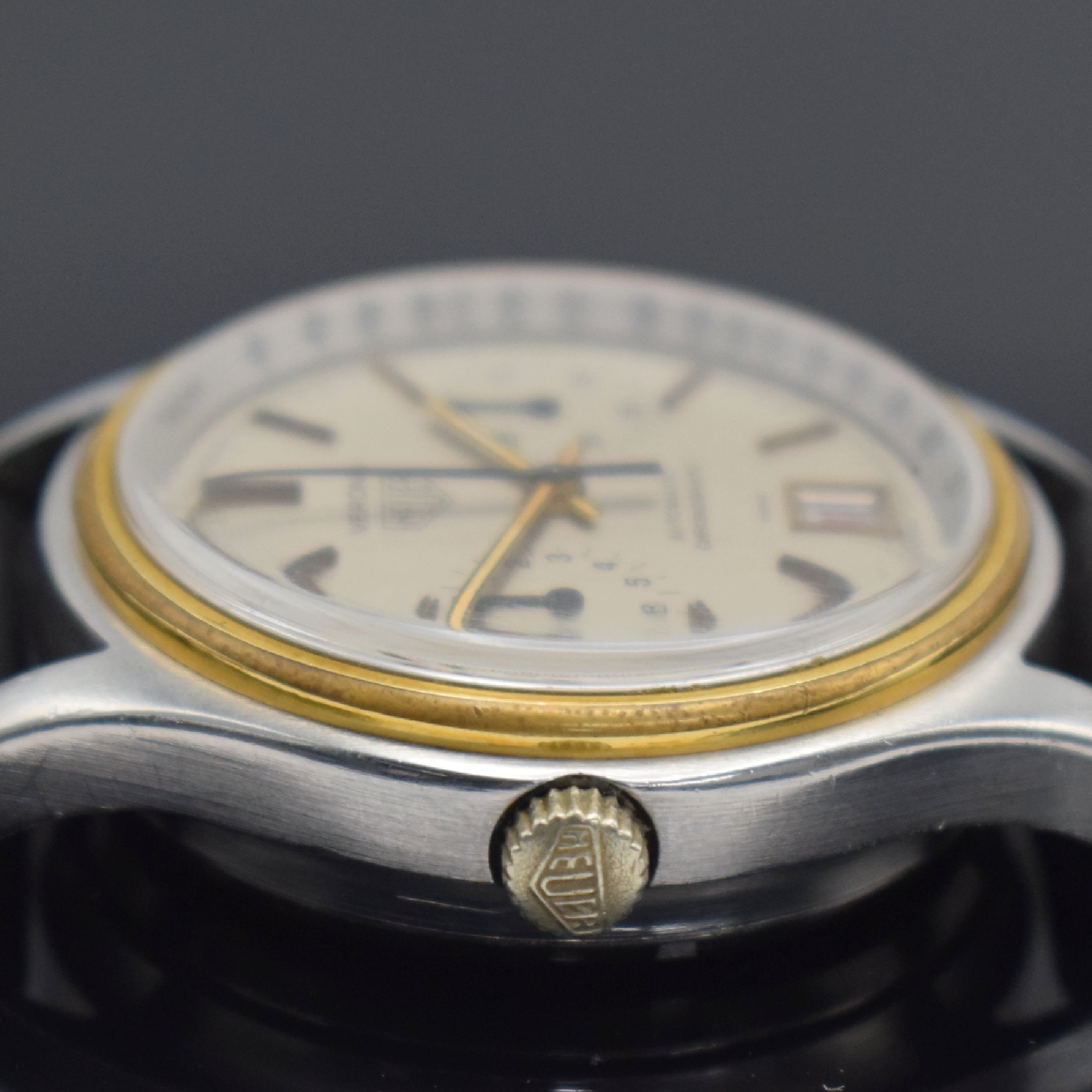 Detail b: HEUER Verona seltene Herrenarmbanduhr mit Chronograph Referenz 110.215, Schweiz um 1979, Automatik, Stahlgeh., verg. Lünette, Boden geschr., ...