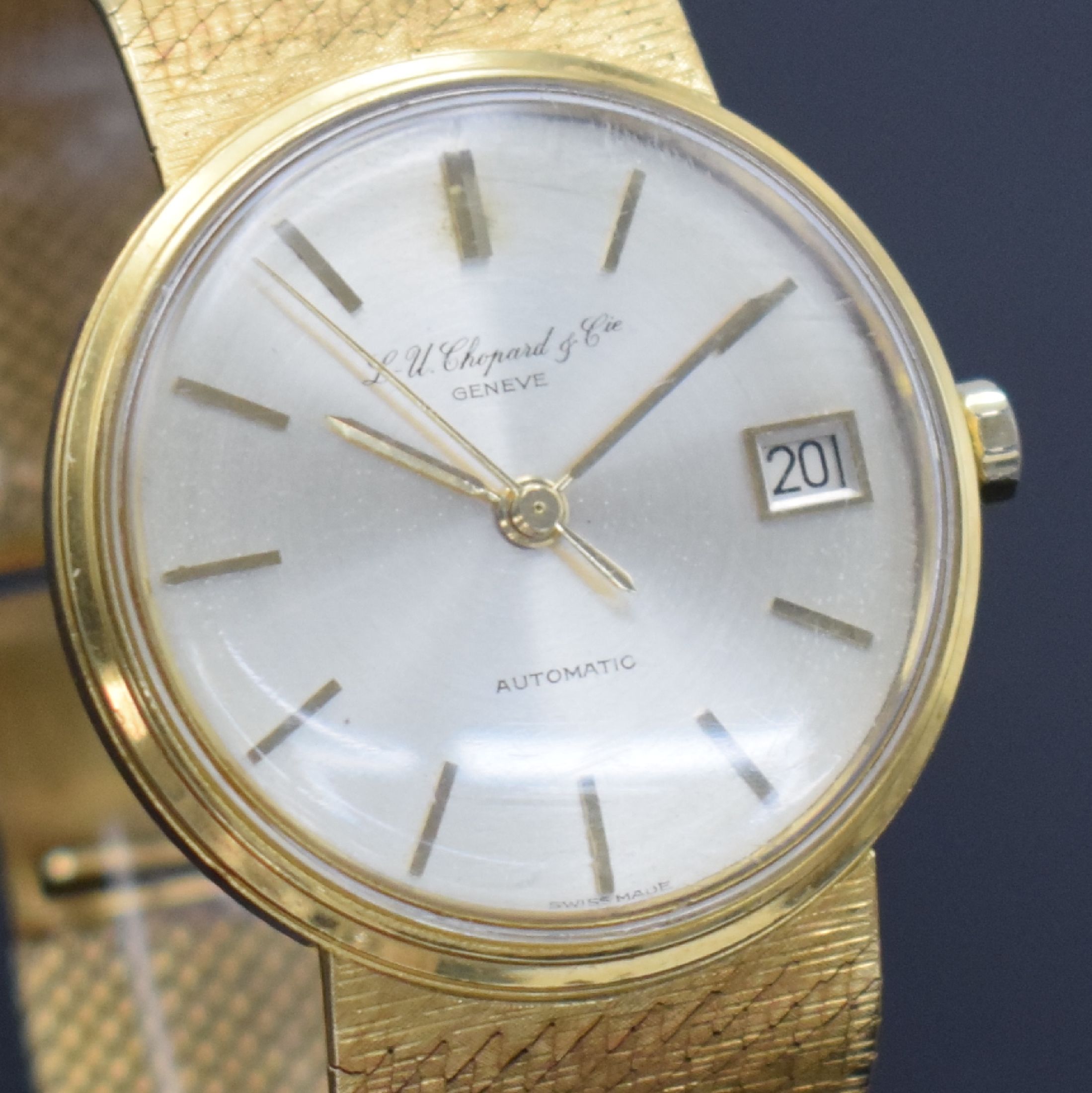 Detail e: L. U. CHOPARD & Cie Herrenarmbanduhr in GG 750/000 mit Goldband Referenz 1011, Schweiz um 1980, Automatik, 2-teil. Gehäuse, Boden aufgedr., orig. ...