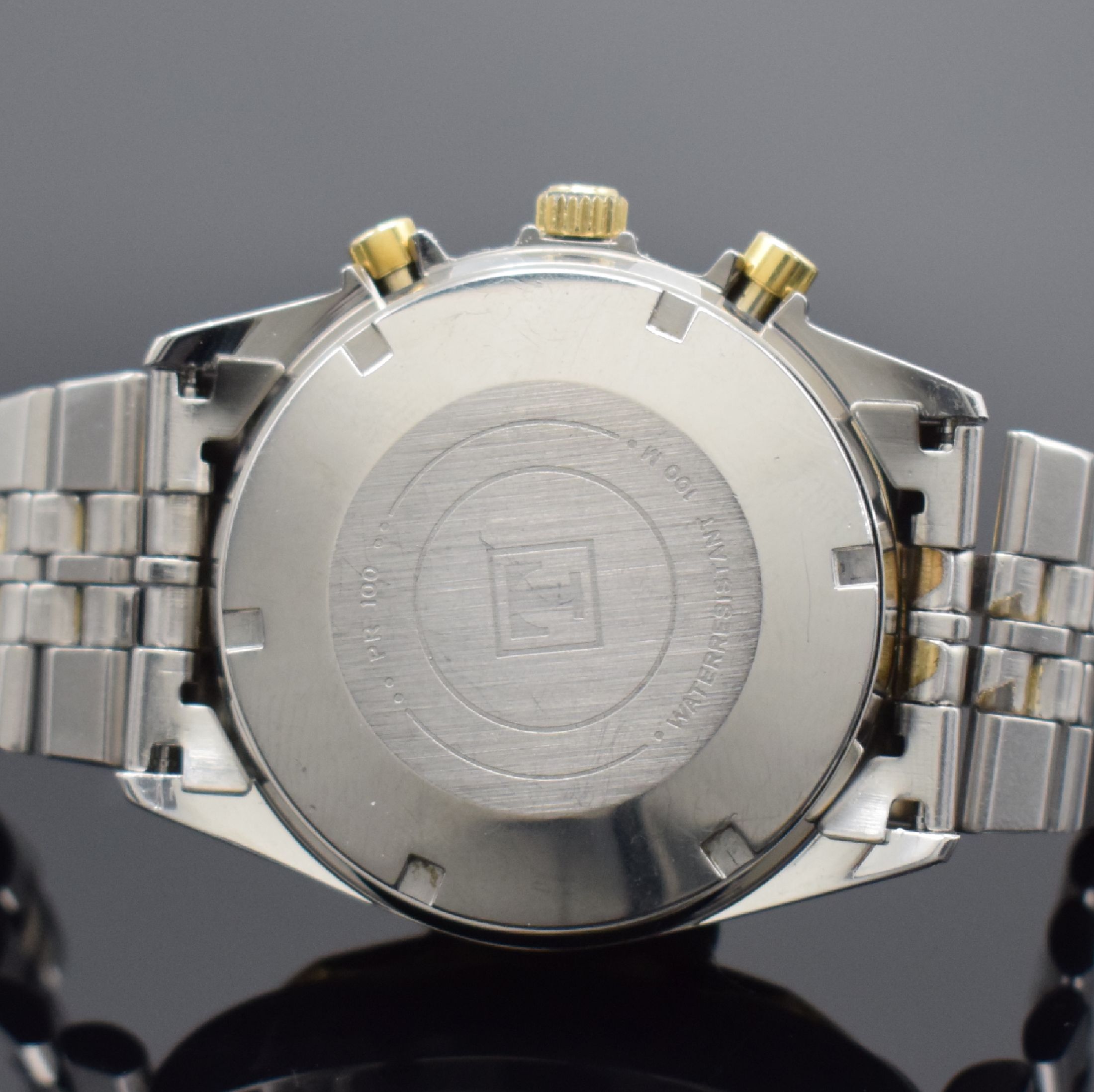 Detail d: TISSOT PR 100 Herrenchronograph in Stahl/ vergoldet, Schweiz verk. lt. beil. Garantie 11/1985, Automatik, verschr. Geh., verg. 12- eckige Lünette, ...