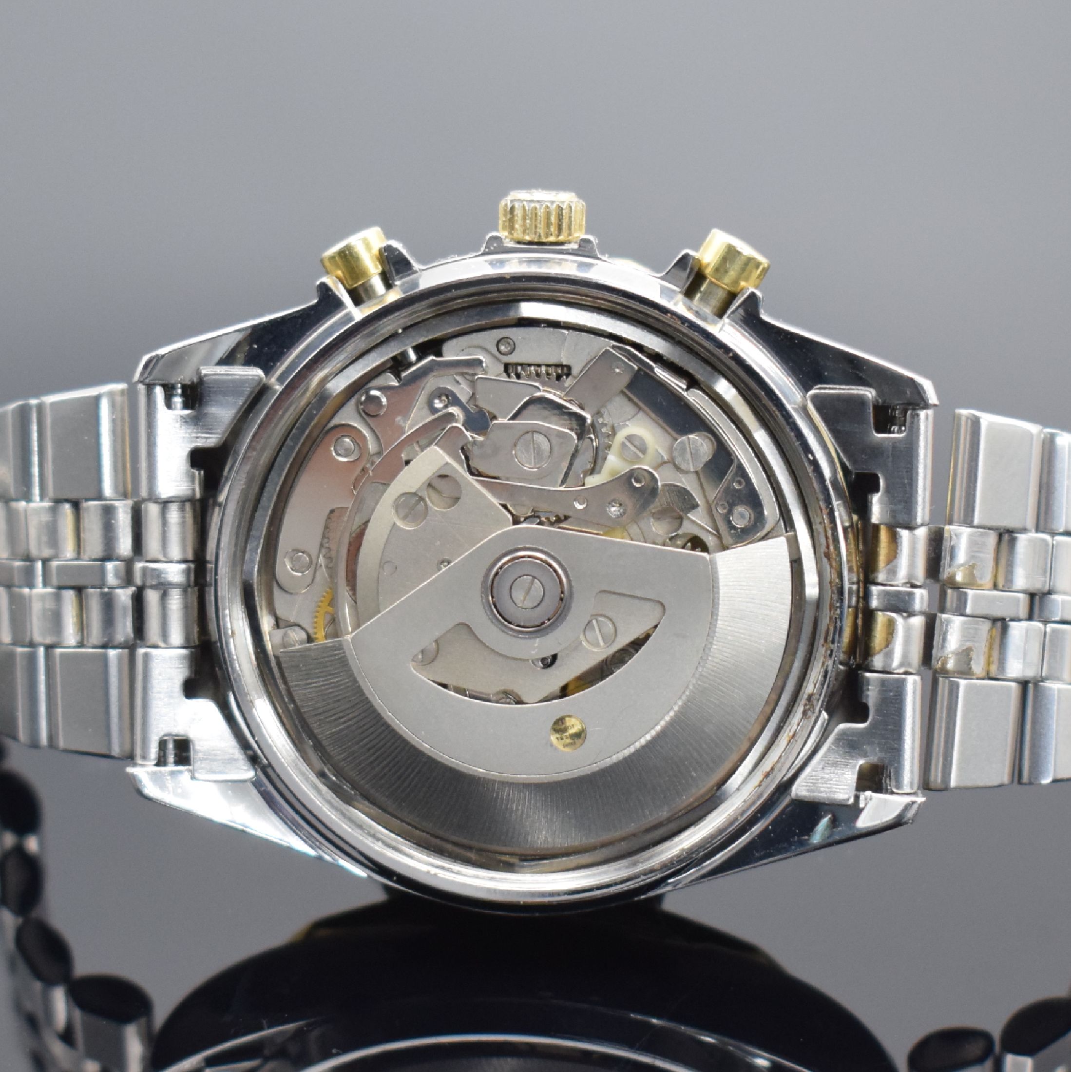Detail e: TISSOT PR 100 Herrenchronograph in Stahl/ vergoldet, Schweiz verk. lt. beil. Garantie 11/1985, Automatik, verschr. Geh., verg. 12- eckige Lünette, ...