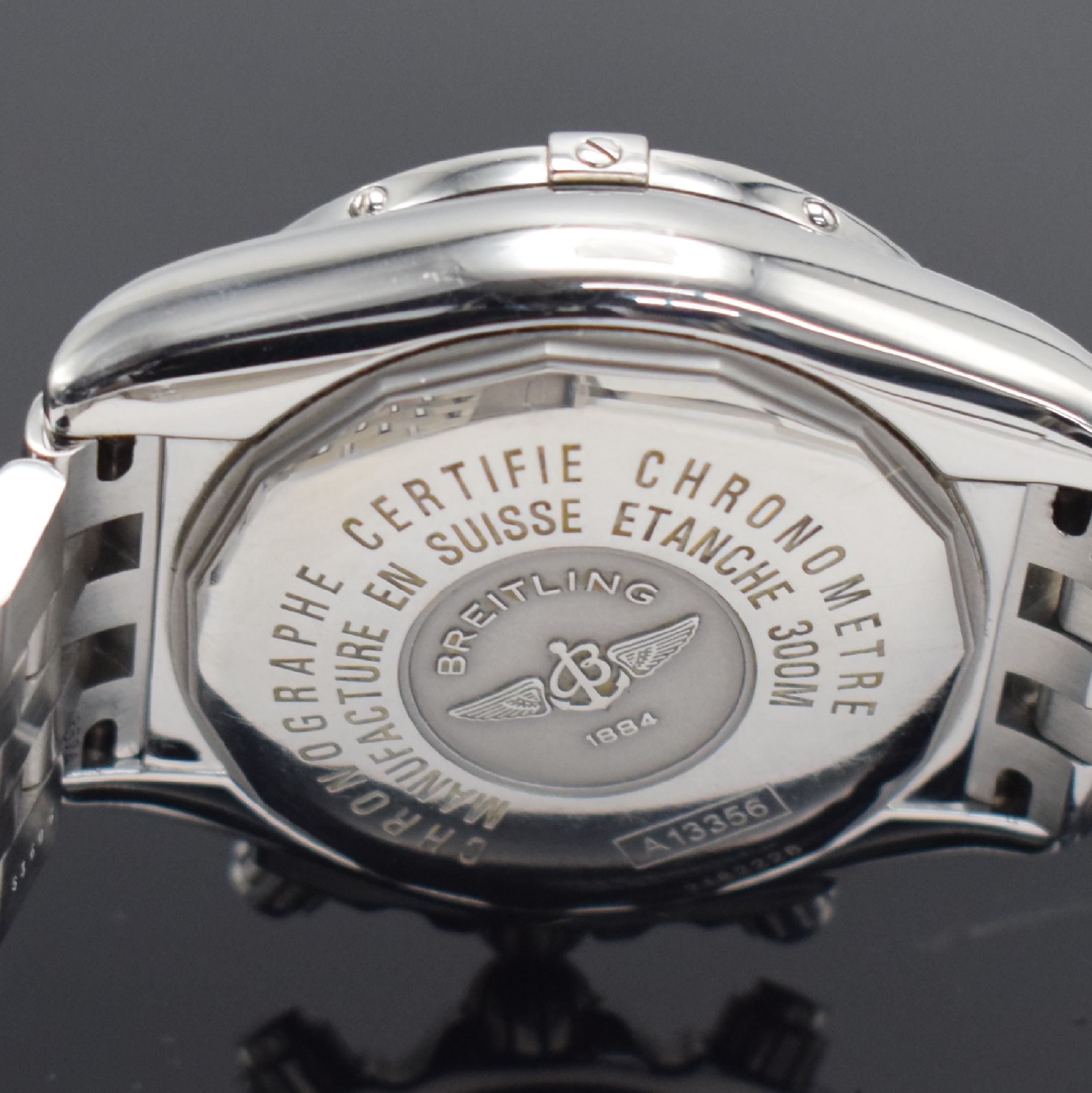 Detail b: BREITLING Chronomat Evolution Herrenarmbanduhr mit Chronograph Referenz A13356, Schweiz um2006, Automatik, verschr. Gehäuse in Edelst., eins. drehb. ...