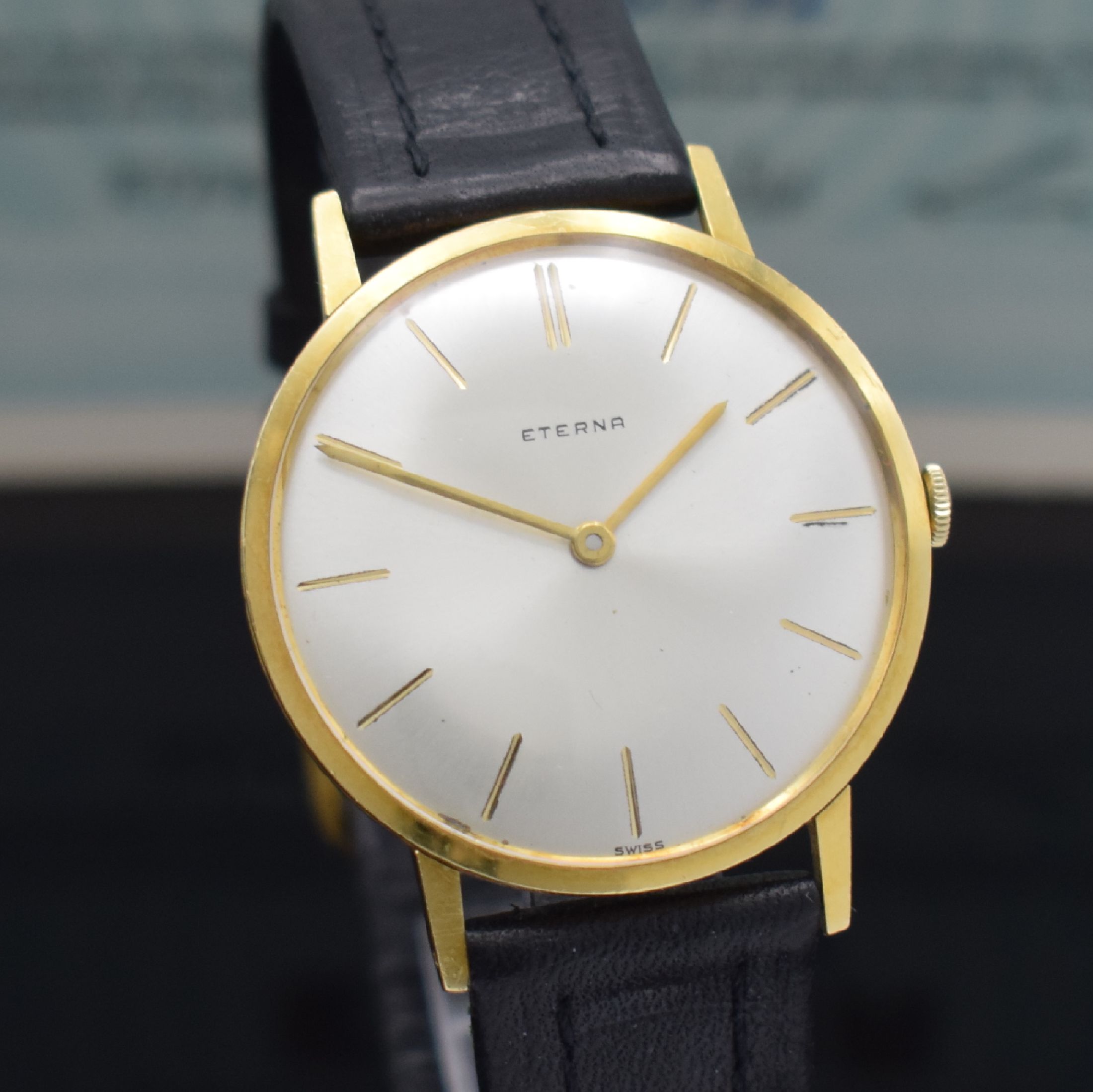 Detail f: ETERNA Herrenarmbanduhr in GG 750/000 mit original Papier Referenz 744, Schweiz verk. lt. Papier 1964, Handaufzug, flaches Geh., Boden & Glasrand ...