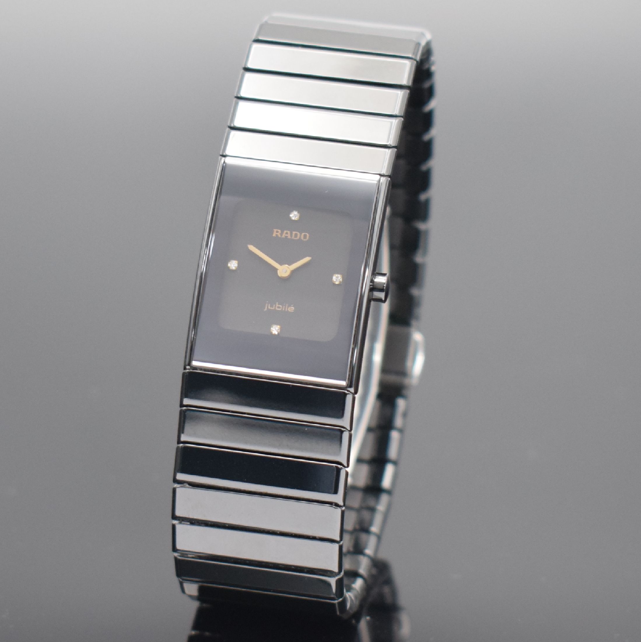 Detail a: RADO Jubile Damenarmbanduhr, Schweiz um 1997, quarz, Keramikgeh., Keramik-Gliederband m. dopp. Faltschl., schwarzes Zifferbl., gold. Zeiger, M. ca. ...