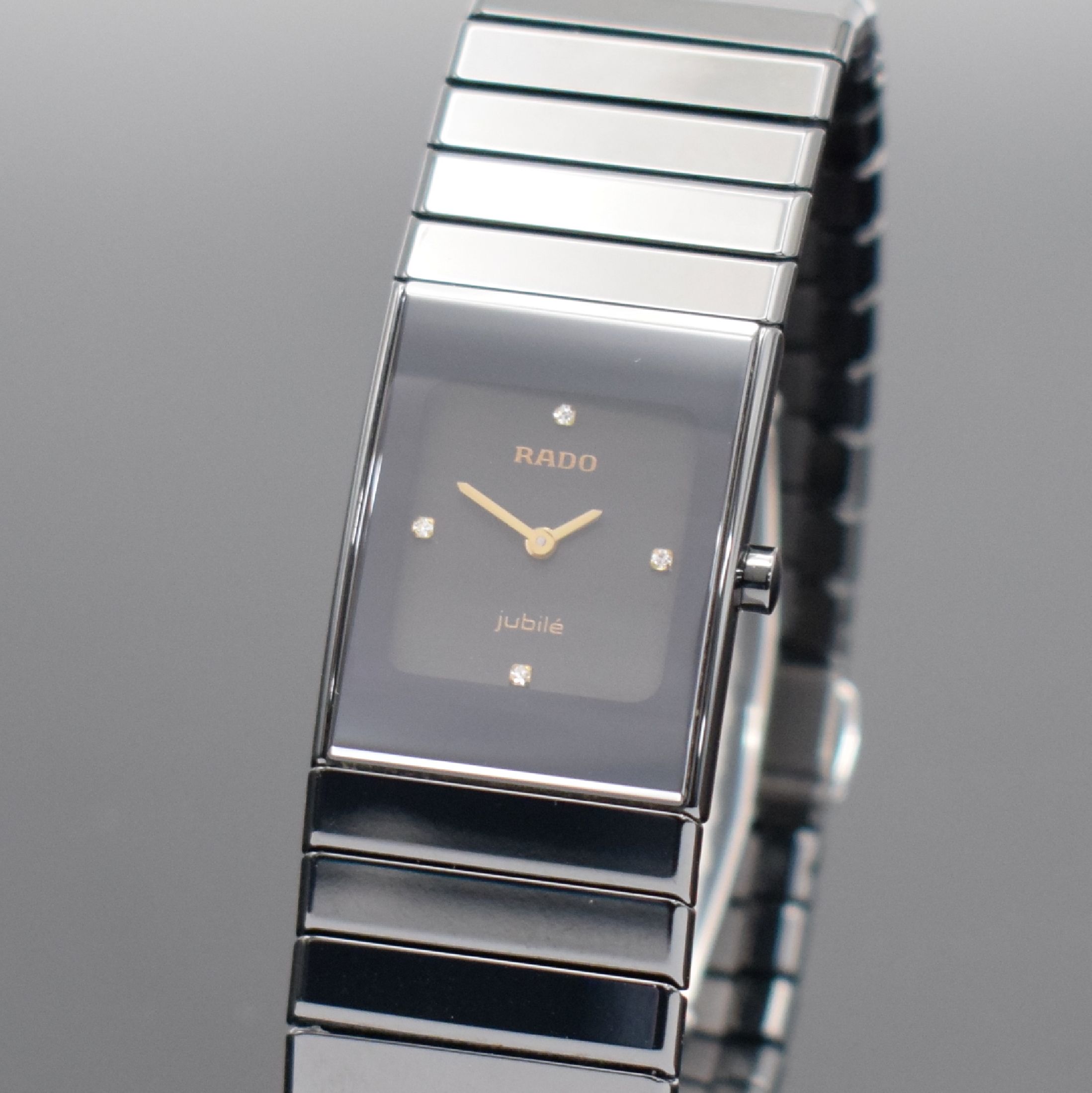 Detail b: RADO Jubile Damenarmbanduhr, Schweiz um 1997, quarz, Keramikgeh., Keramik-Gliederband m. dopp. Faltschl., schwarzes Zifferbl., gold. Zeiger, M. ca. ...