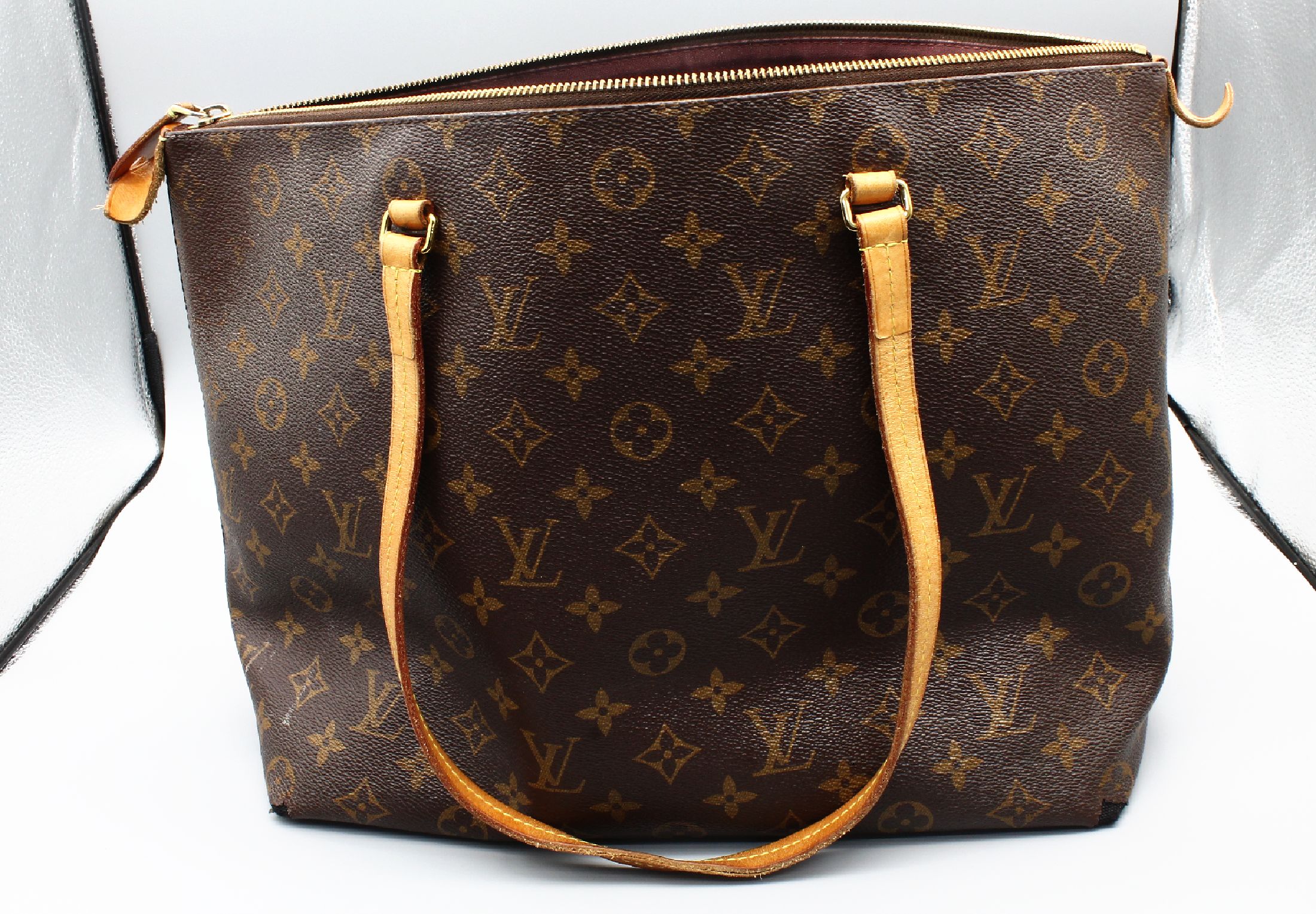 Detail a: LOUIS VUITTON Tote Bag, Iena MM, Monogramm Canvas Braun, Innen mit bordeauxfarbenem Stoff, großes Innenfach mit 3 Seitenfächer, aussen mit ...