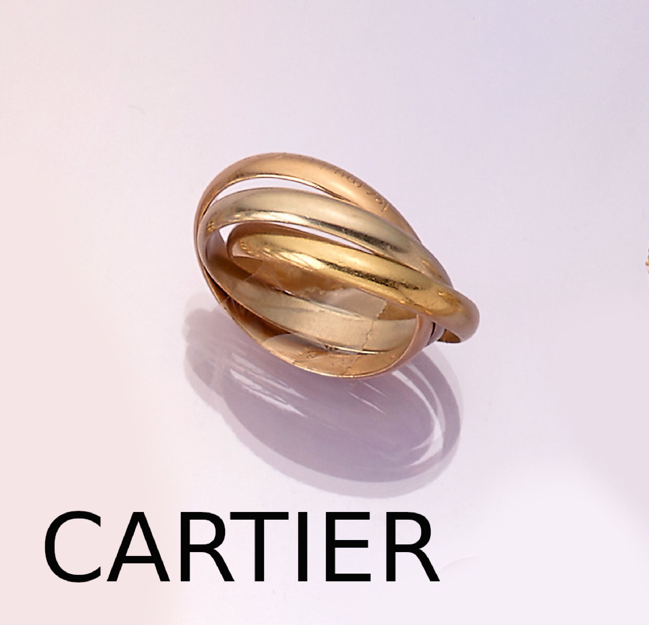 18 kt Gold CARTIER Trinity-Ring, GG/WG/RG 750/000, sign., RW 63