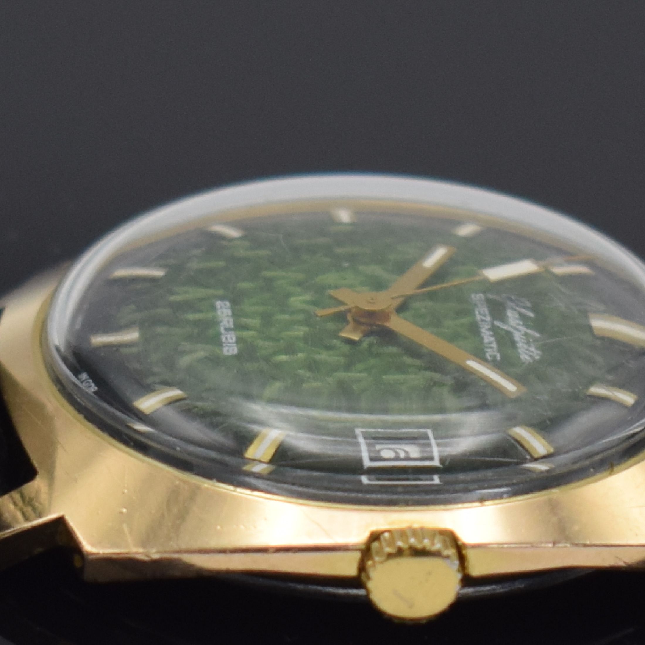 Detail d: GLASHÜTTE Spezimatic Herrenarmbanduhr mit seltenem Zifferblatt, DDR um 1975, Automatik, verg. Gehäuse, Stahlboden aufgedr., seltenes grünes, ...