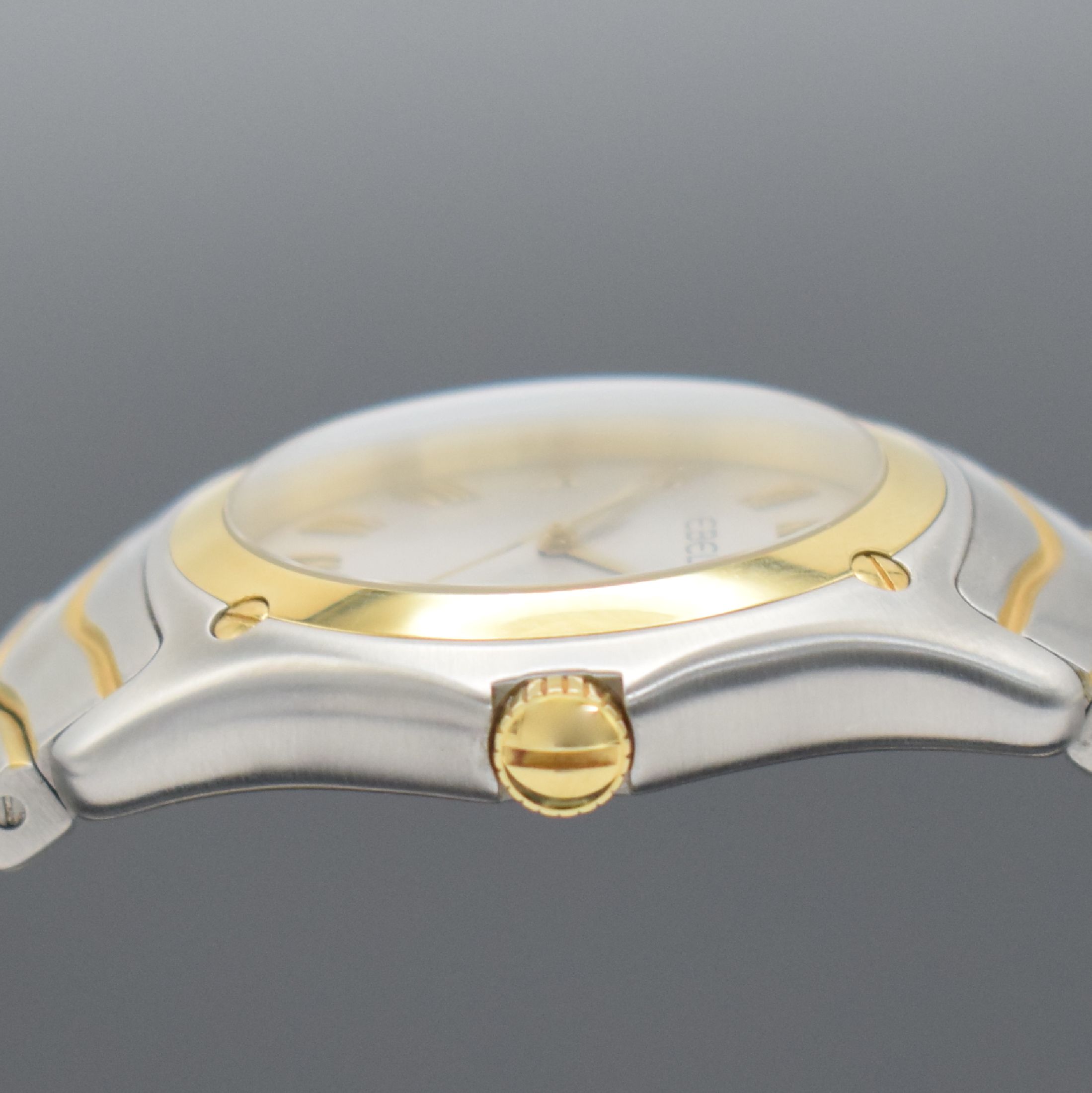 Detail e: EBEL Classic Wave Herrenarmbanduhr Referenz 1187F41, Schweiz verk. lt. beil. Pap. 03/2005, quarz, Edelstahl/Gold komb. inkl. Gliederband m. dopp. ...