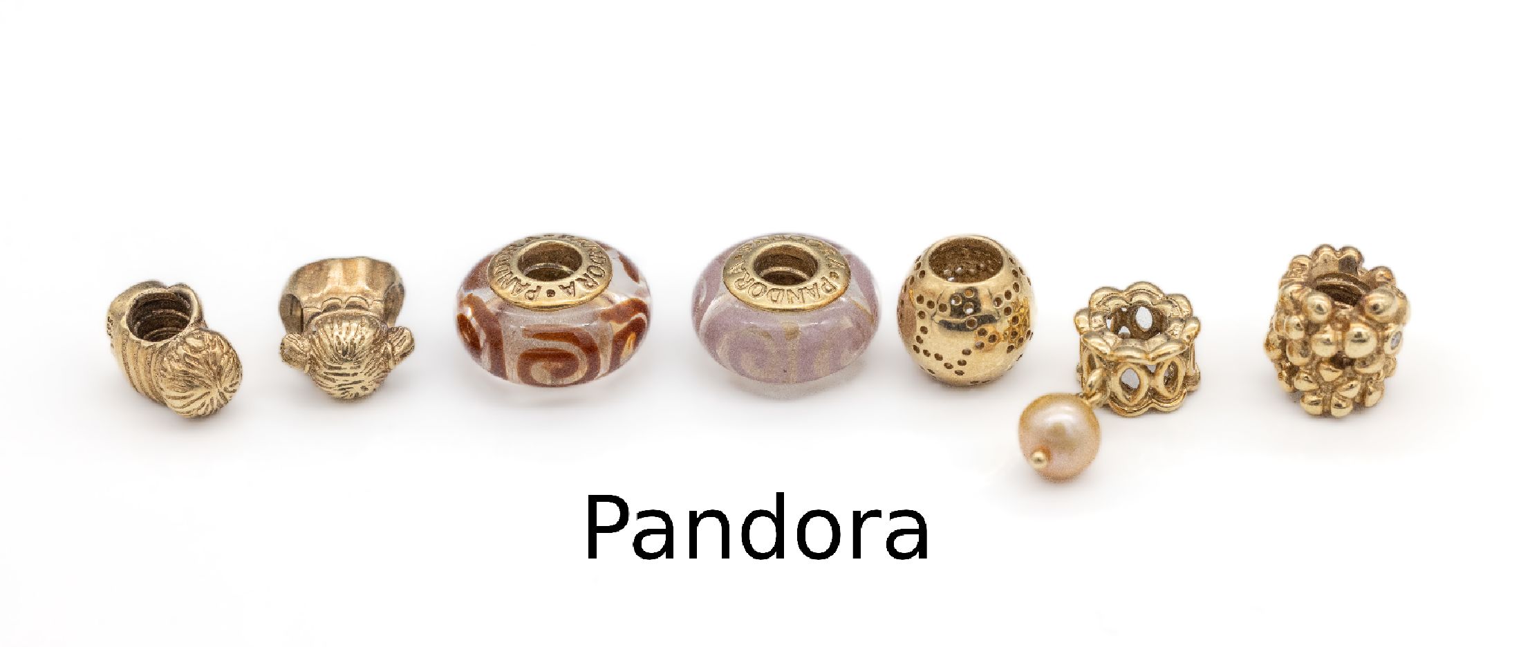 7 14 kt Gold PANDORA-Charms, GG 585/000, inversch. Formen, 1 X kl. Mädchen, 1 x kl. Junge, 1 x abstrakt mit 2 kl. Brillanten, 1 x mit bewegl. ...