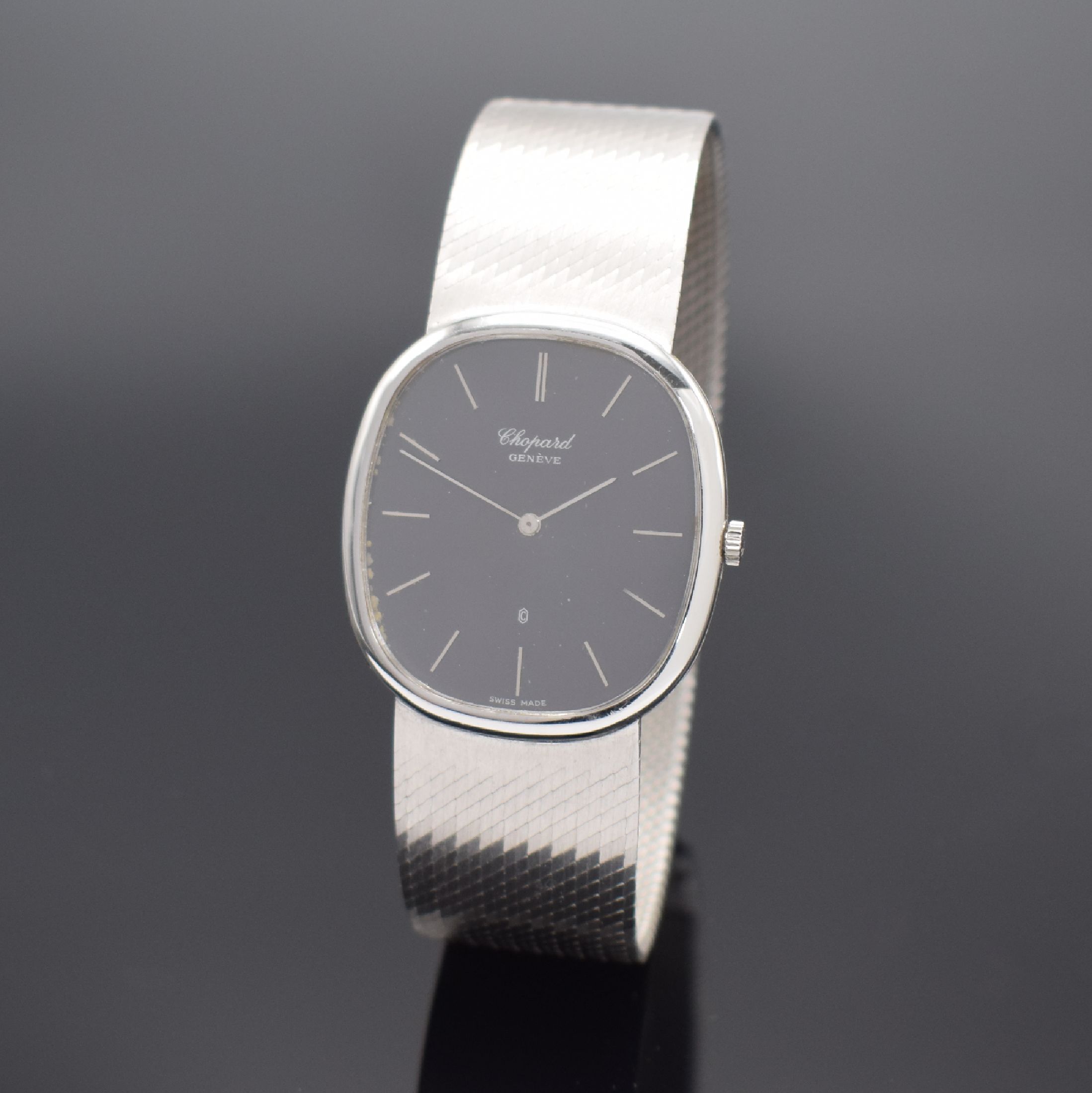 CHOPARD Herrenarmbanduhr in WG 750/000 Referenz 2152, Schweiz verk. lt. beil. Garantie 09/1980, quarz, Milanaiseband, Boden 4-fach verschr., graues ...