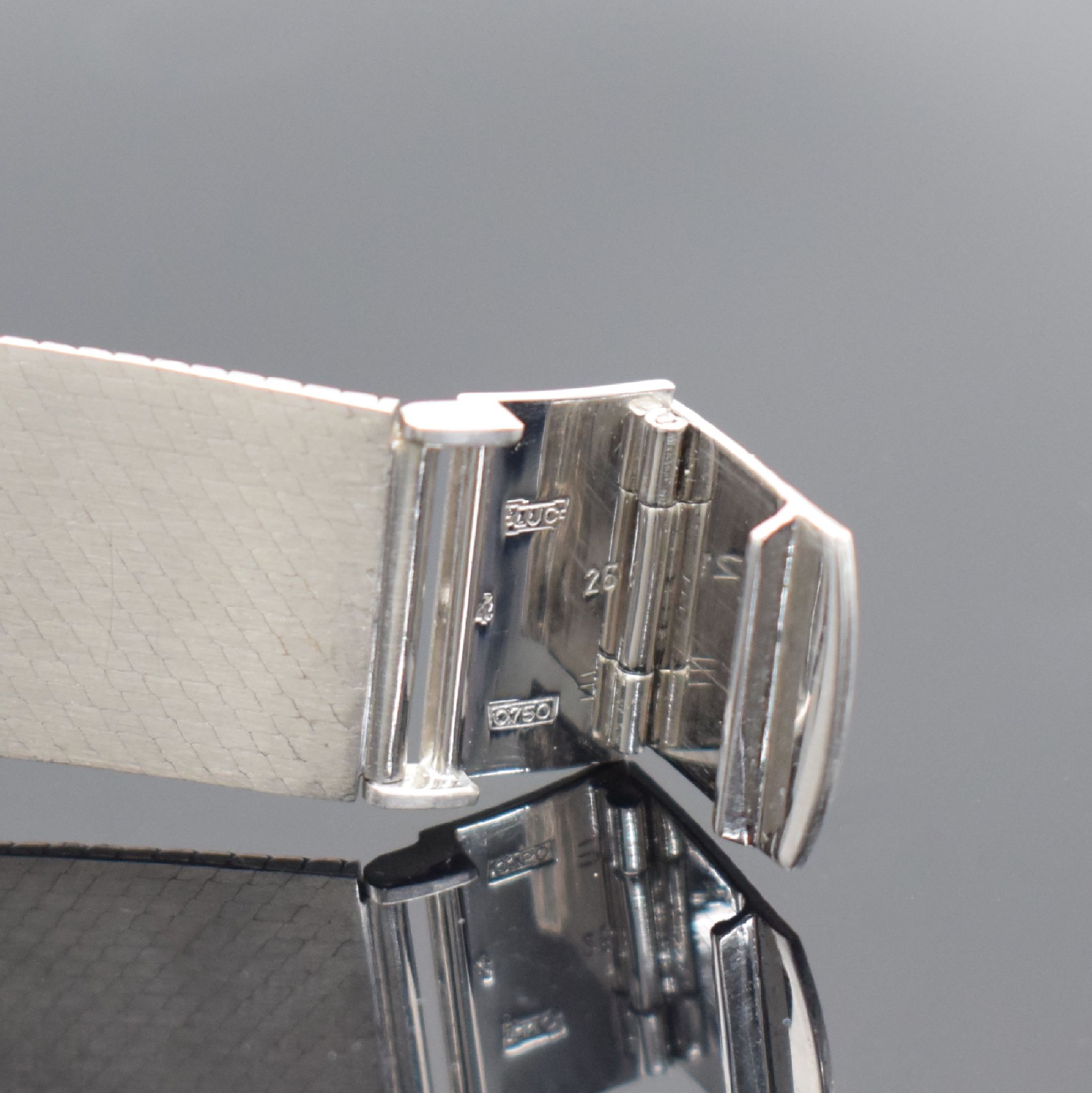 Detail c: CHOPARD Herrenarmbanduhr in WG 750/000 Referenz 2152, Schweiz verk. lt. beil. Garantie 09/1980, quarz, Milanaiseband, Boden 4-fach verschr., graues ...