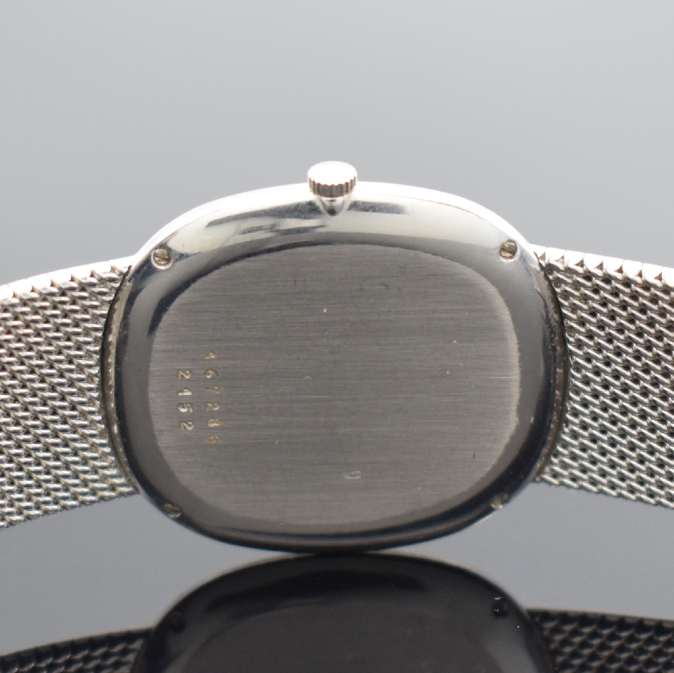 Detail e: CHOPARD Herrenarmbanduhr in WG 750/000 Referenz 2152, Schweiz verk. lt. beil. Garantie 09/1980, quarz, Milanaiseband, Boden 4-fach verschr., graues ...
