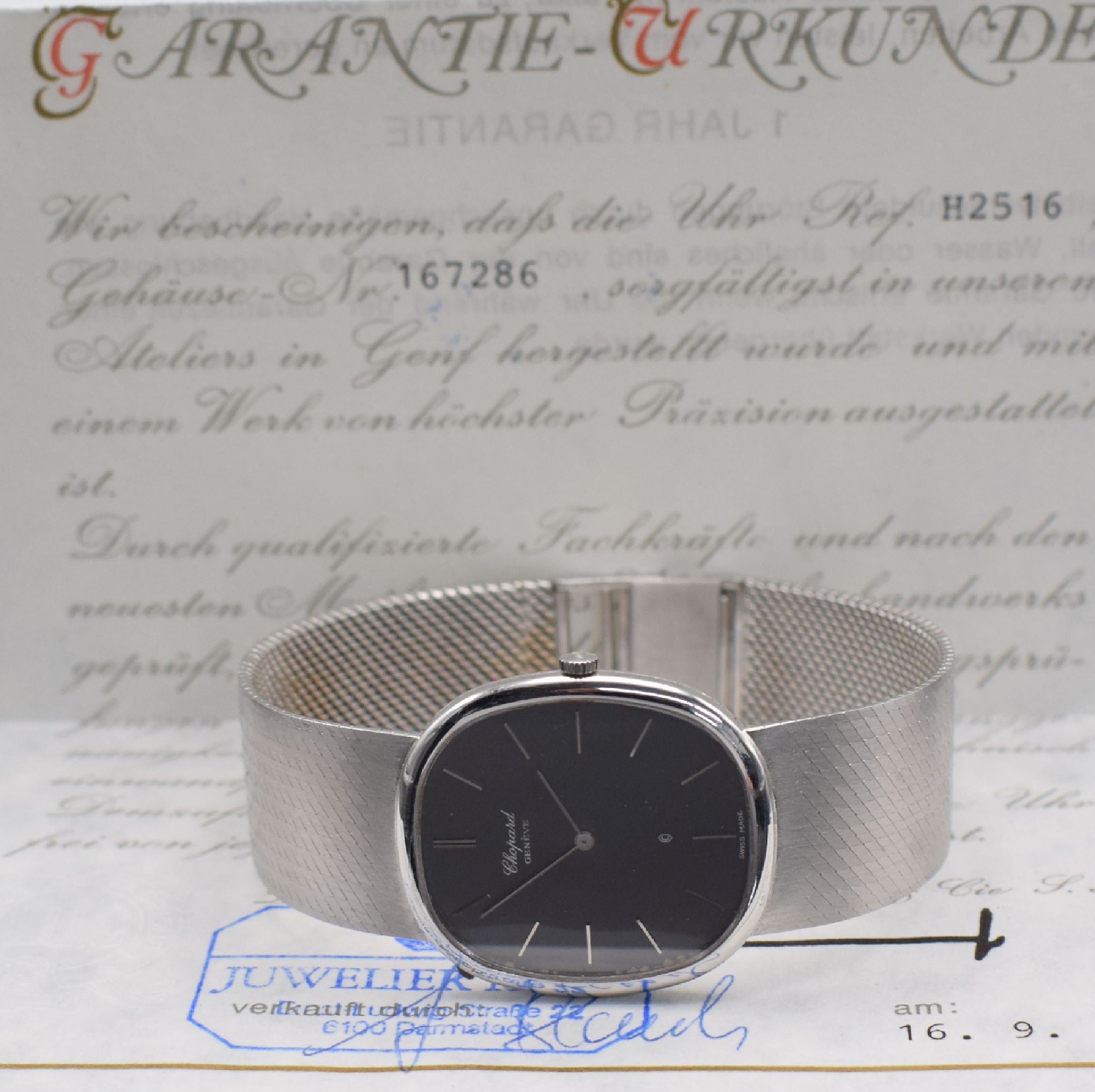 Detail f: CHOPARD Herrenarmbanduhr in WG 750/000 Referenz 2152, Schweiz verk. lt. beil. Garantie 09/1980, quarz, Milanaiseband, Boden 4-fach verschr., graues ...
