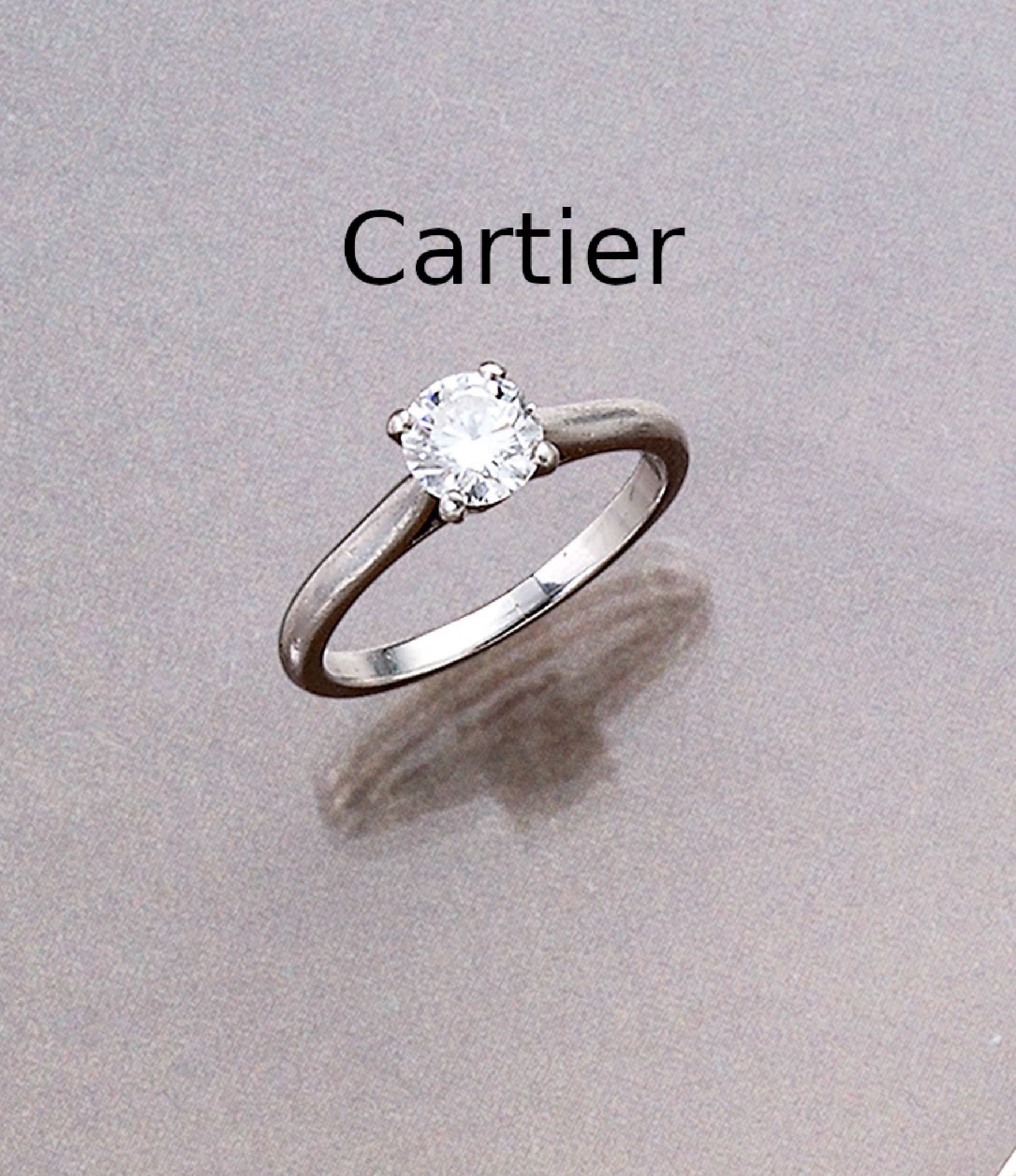 Platin CARTIER Brillant-Ring, Brillant ca. 0.72 ct feines Weiß/vs1, sign. und num., Zertifikat und orig. Box, RW 52