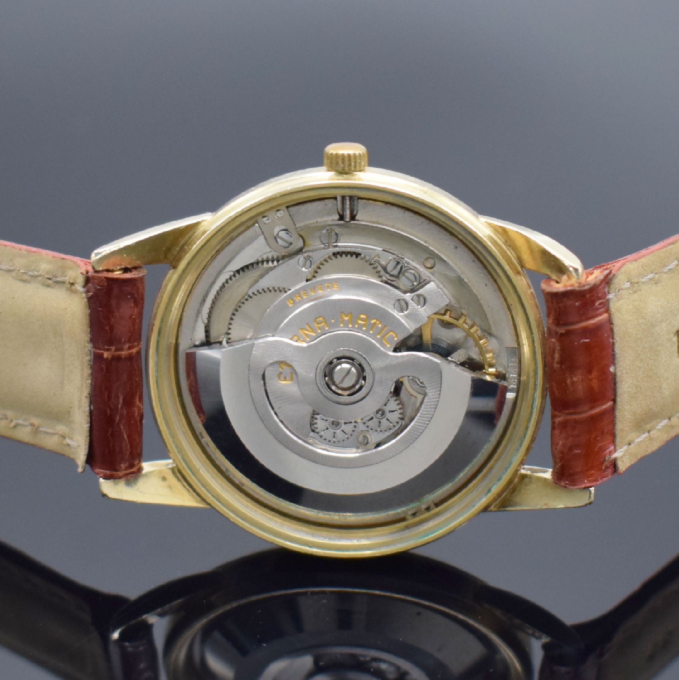 Detail c: ETERNA-MATIC Herrenarmbanduhr, Schweiz um 1955, Automatik, gold filled Geh., Stahlboden verschr., pat. Zifferbl. m. gold. Std.-Ind., gold. Zeiger, ...
