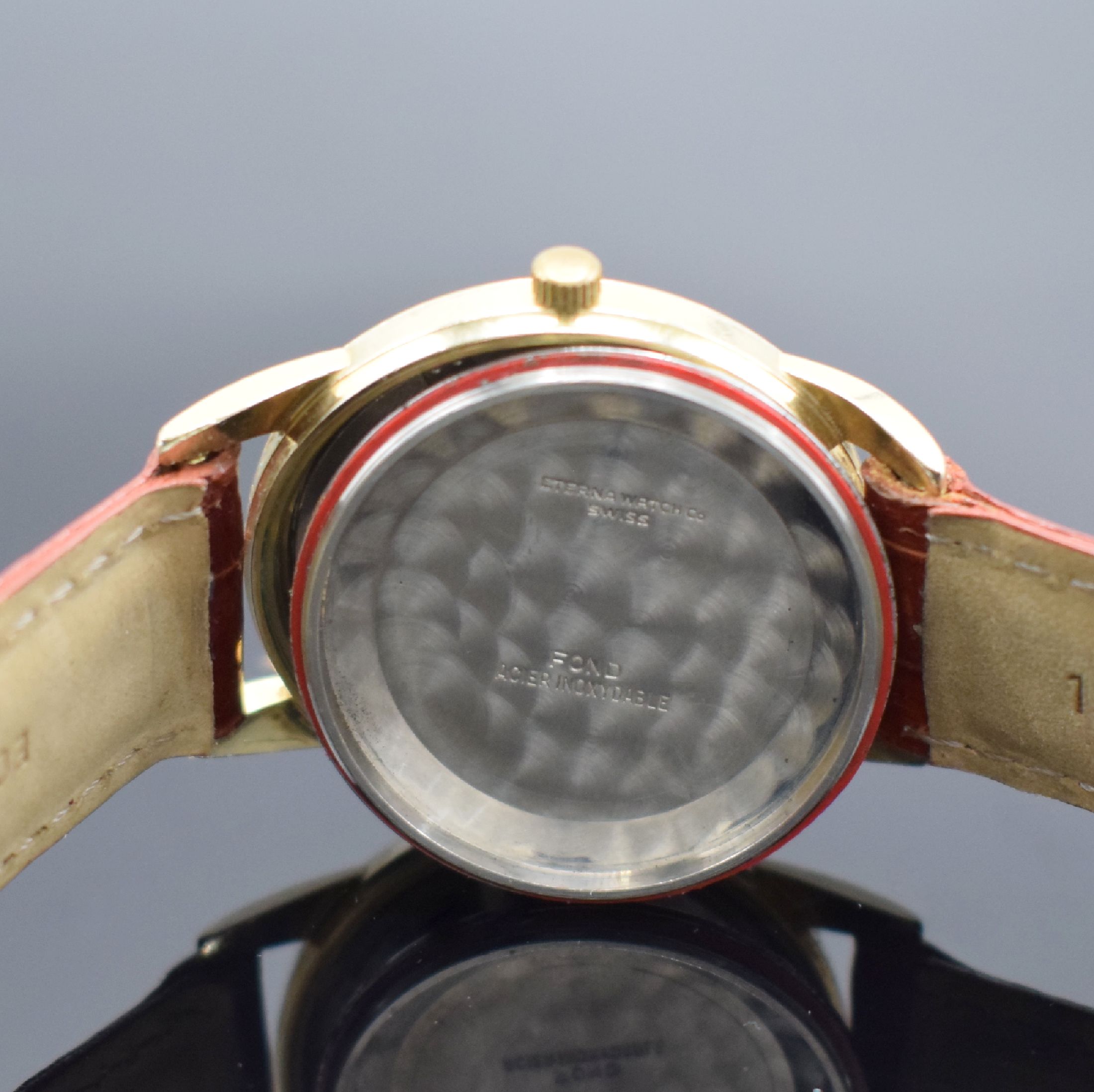 Detail e: ETERNA-MATIC Herrenarmbanduhr, Schweiz um 1955, Automatik, gold filled Geh., Stahlboden verschr., pat. Zifferbl. m. gold. Std.-Ind., gold. Zeiger, ...