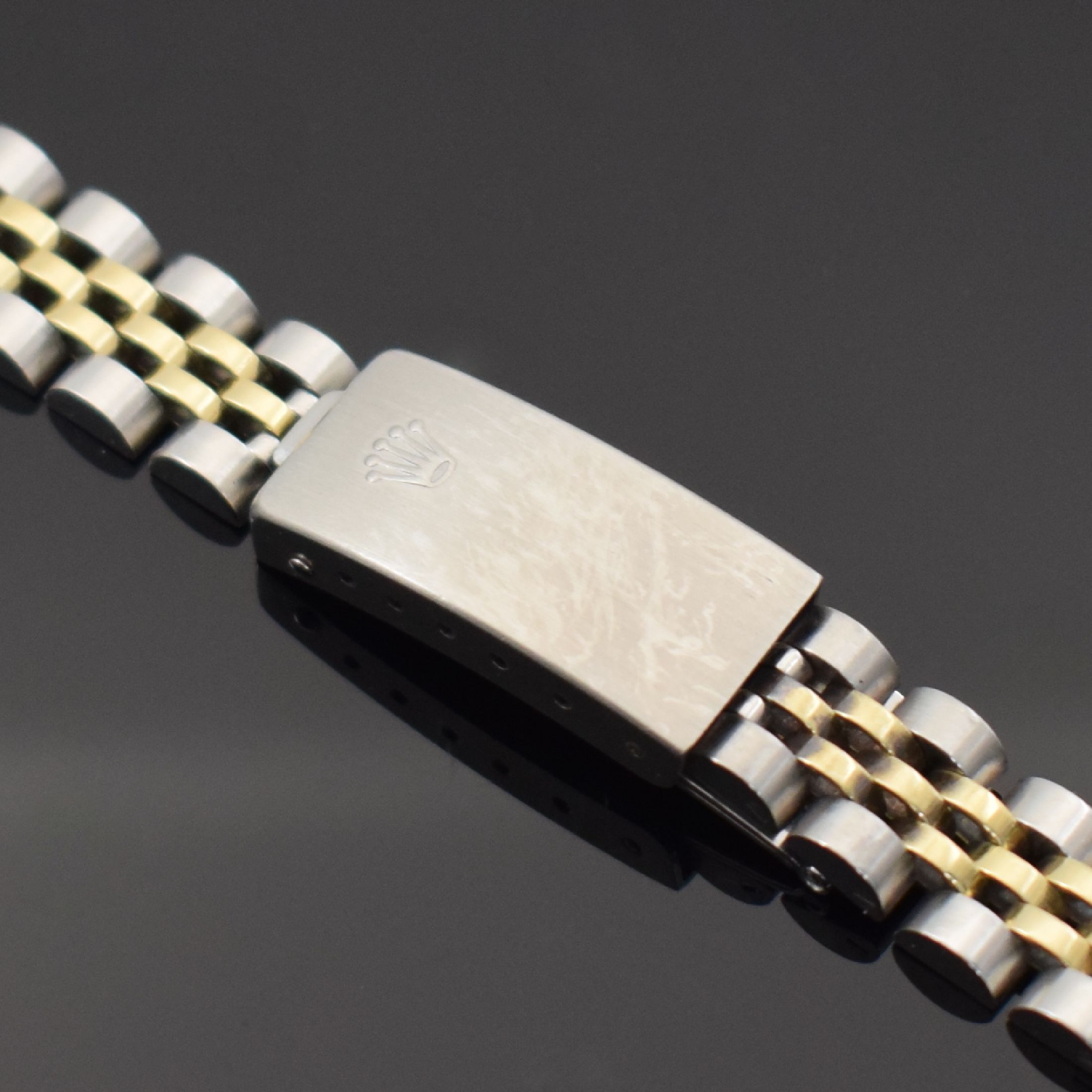 Detail a: ROLEX Jubilee-Armband für Referenz 6917/69173 in Stahl/Gold, Schweiz um 1982, Damenuhrband Ref. 62523-D14, Anstoß-Ref. 468 J, Rolex- Mäppchen ...