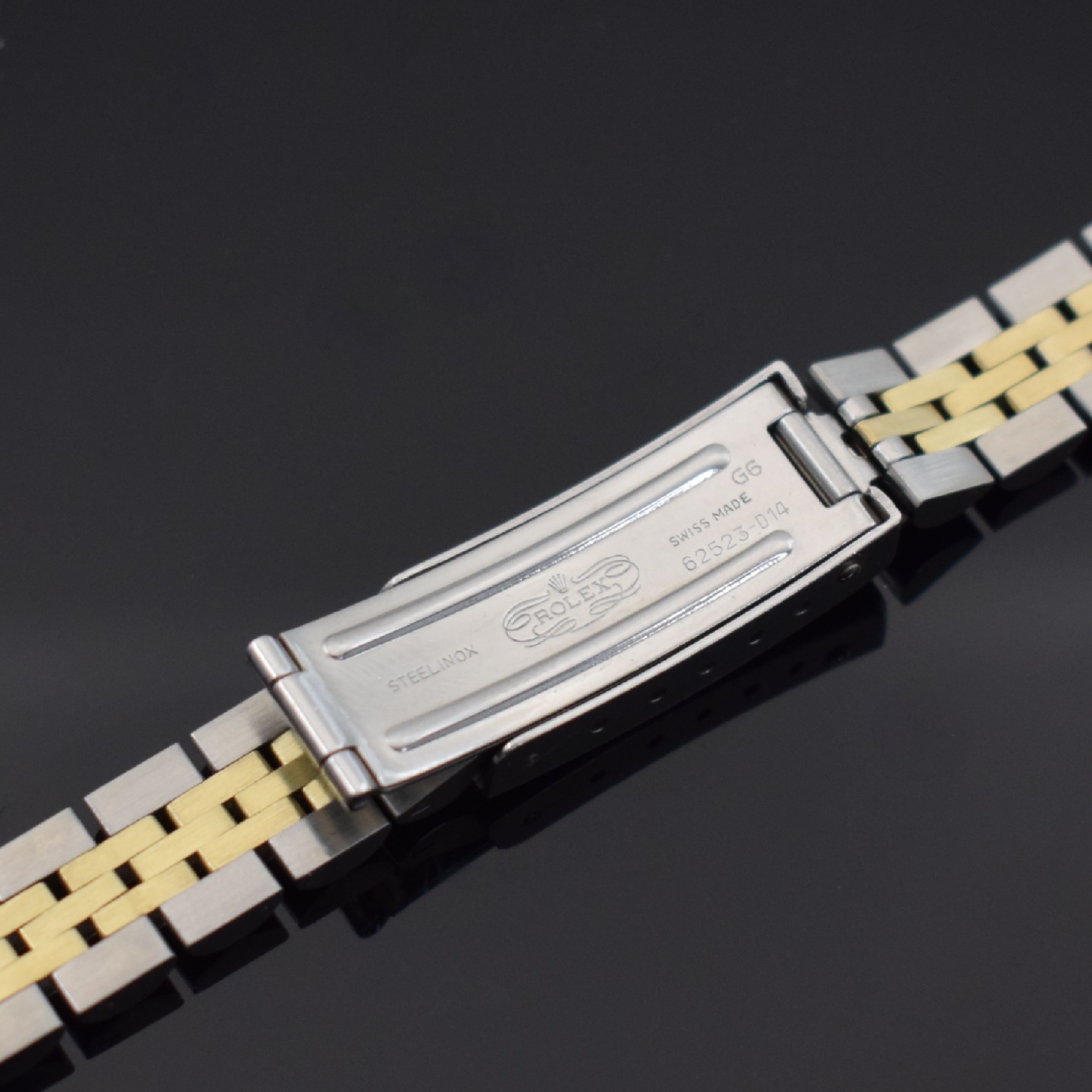Detail b: ROLEX Jubilee-Armband für Referenz 6917/69173 in Stahl/Gold, Schweiz um 1982, Damenuhrband Ref. 62523-D14, Anstoß-Ref. 468 J, Rolex- Mäppchen ...