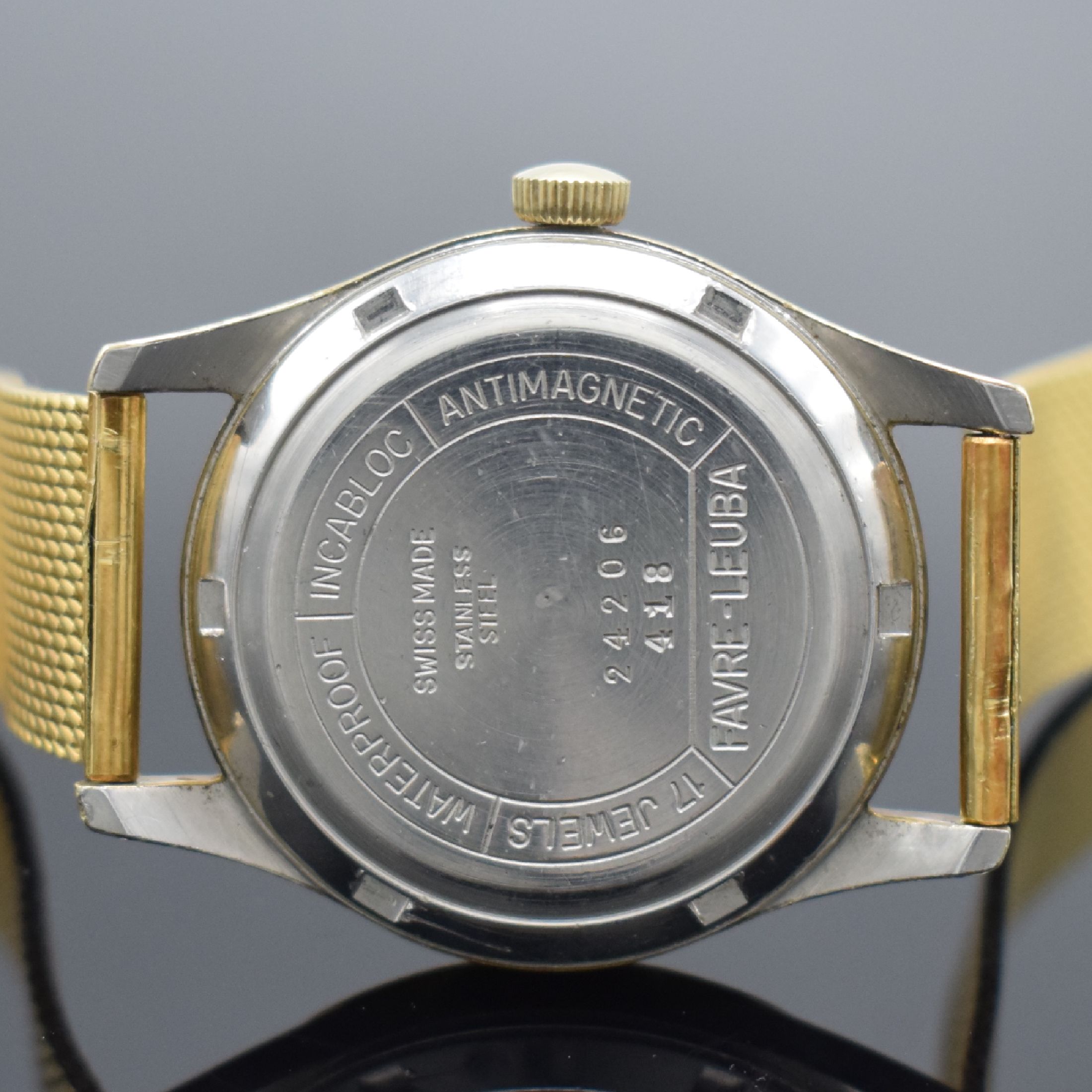 Detail d: FAVRE LEUBA Herrenarmbanduhr, Schweiz um 1955, Automatik, Geh. m. Goldhaube, Stahlboden verschr., Band in GG 750/000, silb., guill. Zifferbl., gold. ...