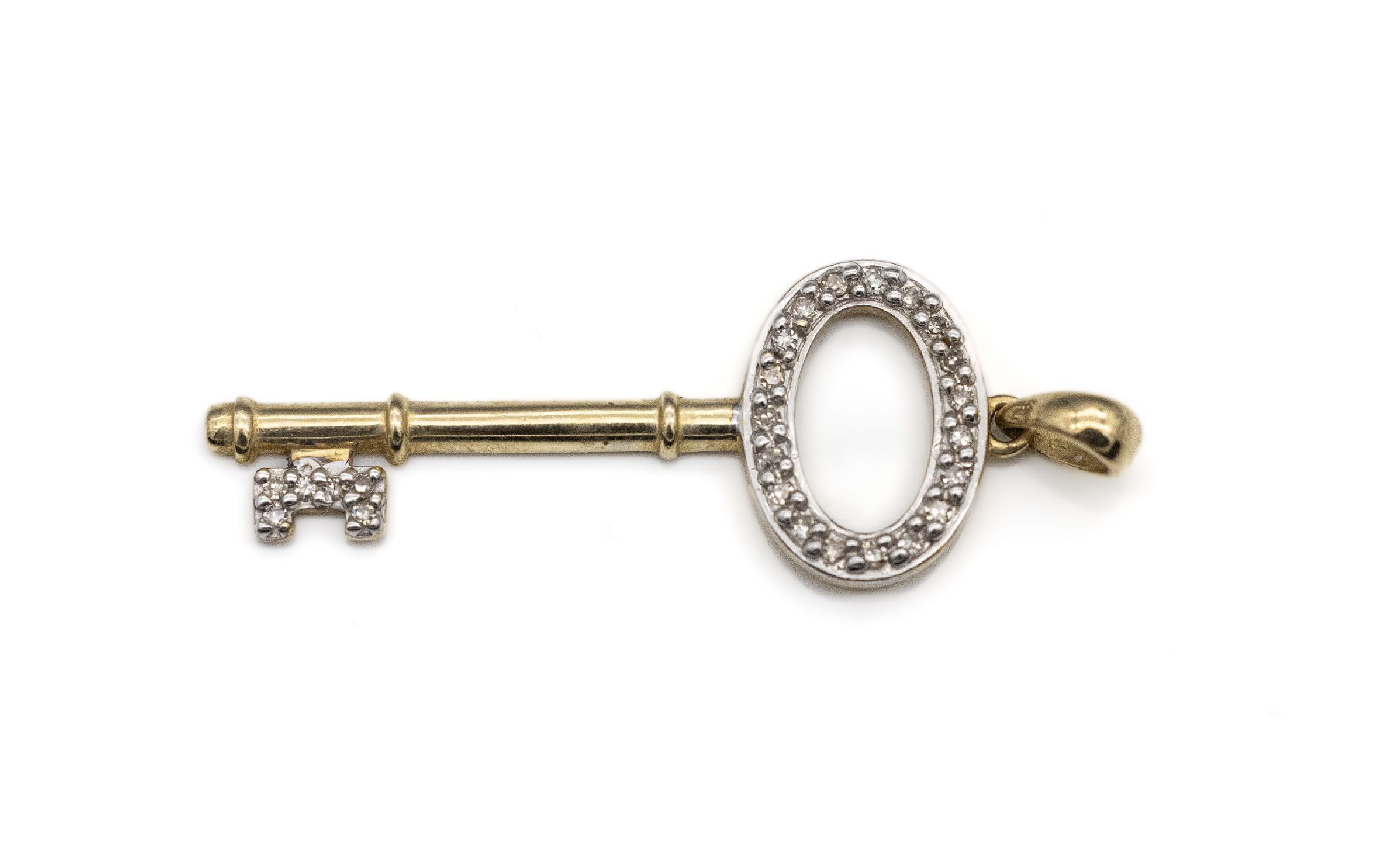 10 kt Gold Diamant-Anhänger "Schlüssel", GG416/000, 25 8/8-Diamanten zus. ca. 0.10 ct Weiß-get.Weiß/p, ca. 2.6 x 1.1 cm