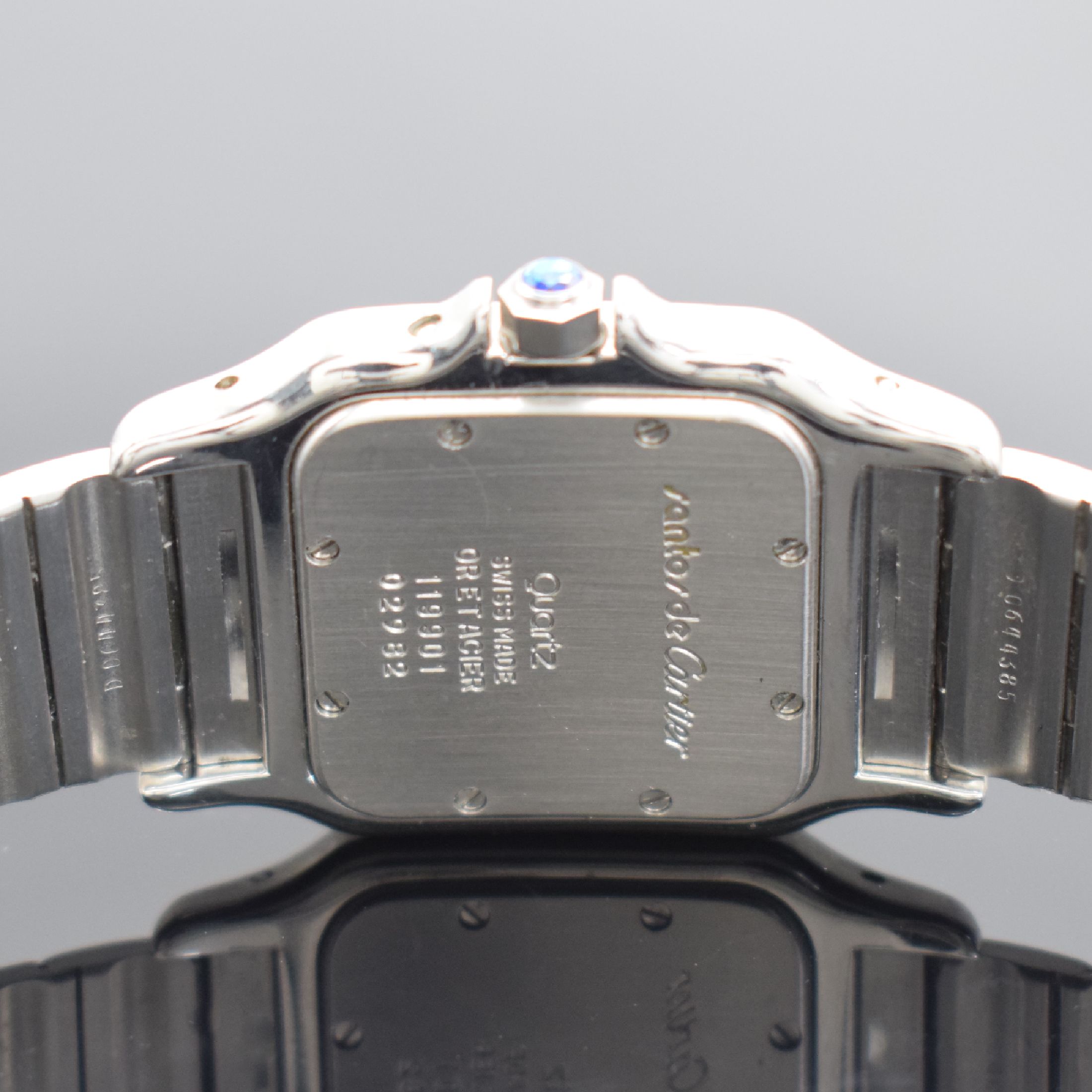 Detail d: CARTIER Santos Herrenarmbanduhr in Stahl/Gold mit Mondphase Referenz 119901, Schweiz um 1995, quarz, Boden 8-fach verschr., orig. Gliederband m. ...