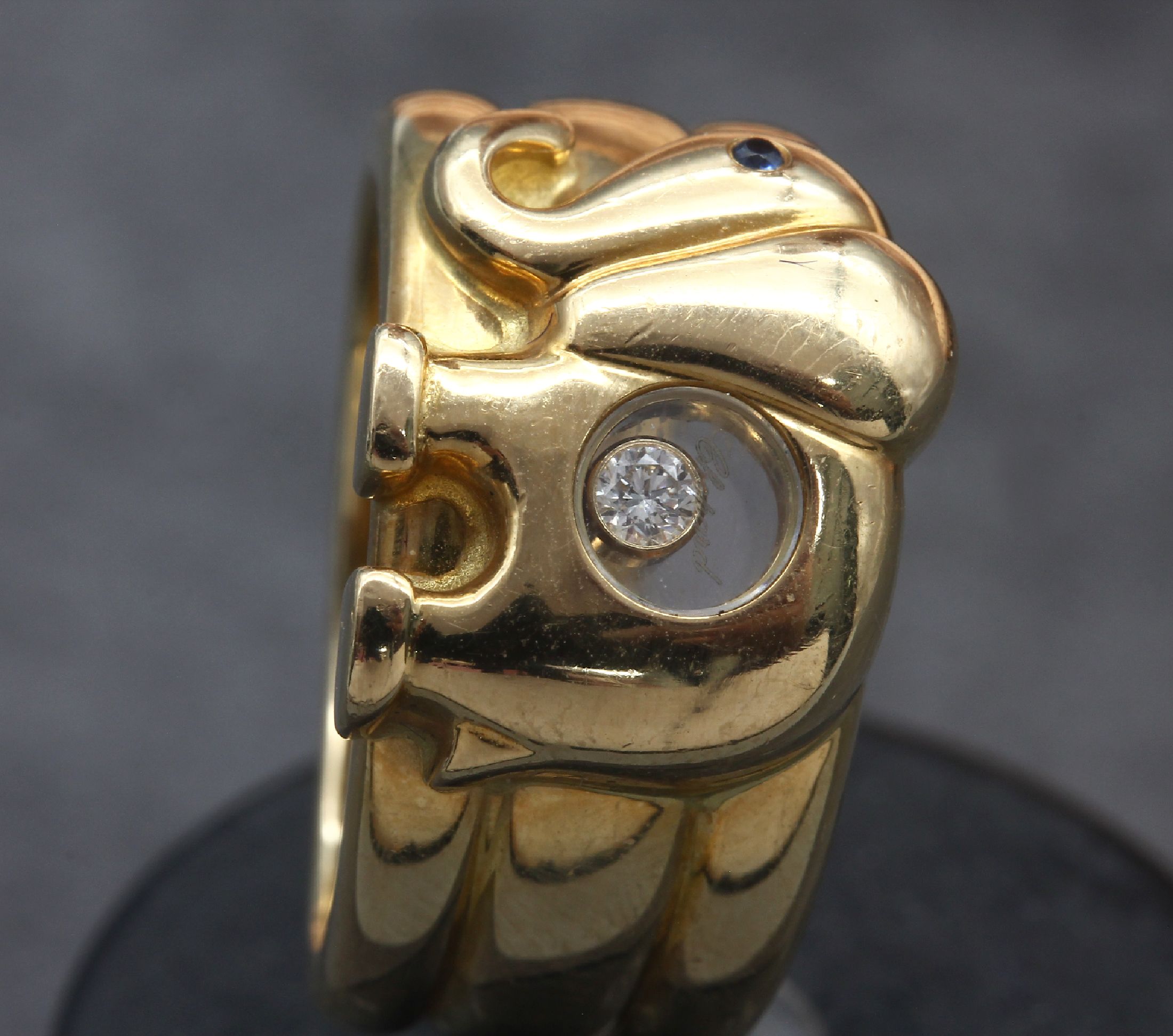 Detail a: 18 kt Gold CHOPARD Ring "Elefant", GG 750/000, Serie Happy Diamond, rundfacett. Saphir als Auge ca. 0.01 ct, 1 Brillant bewegl. unter Glas ...