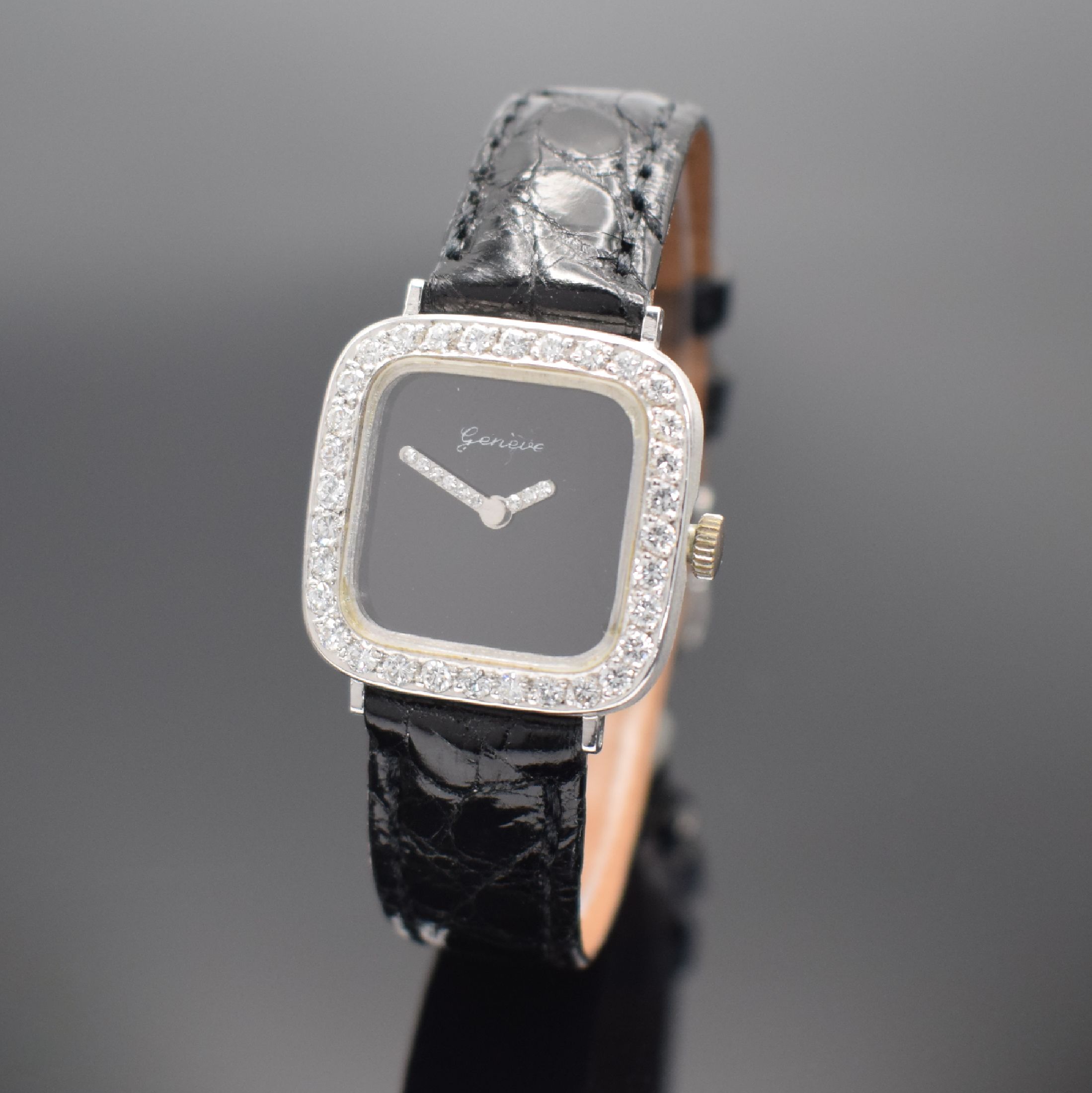 GENEVE Damenarmbanduhr in WG 585/000 mit Diamantbesatz, Schweiz um 1975, Handaufzug, Boden aufgedr., Lünette aufw. m. Diamanten bes., schwarzes ...